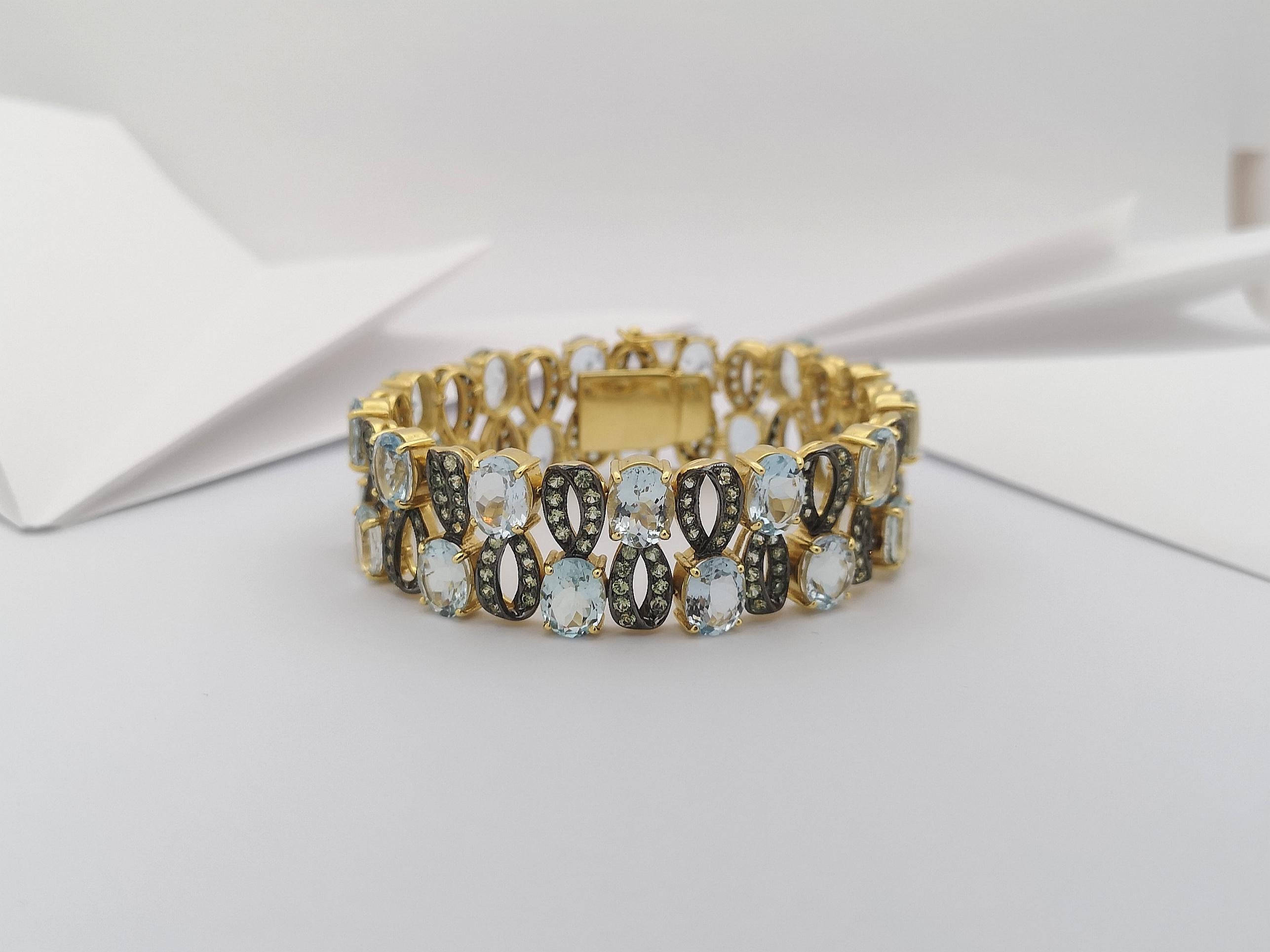 Bracelet en or 18 carats serti d'aigue-marine et de saphirs verts en vente 8