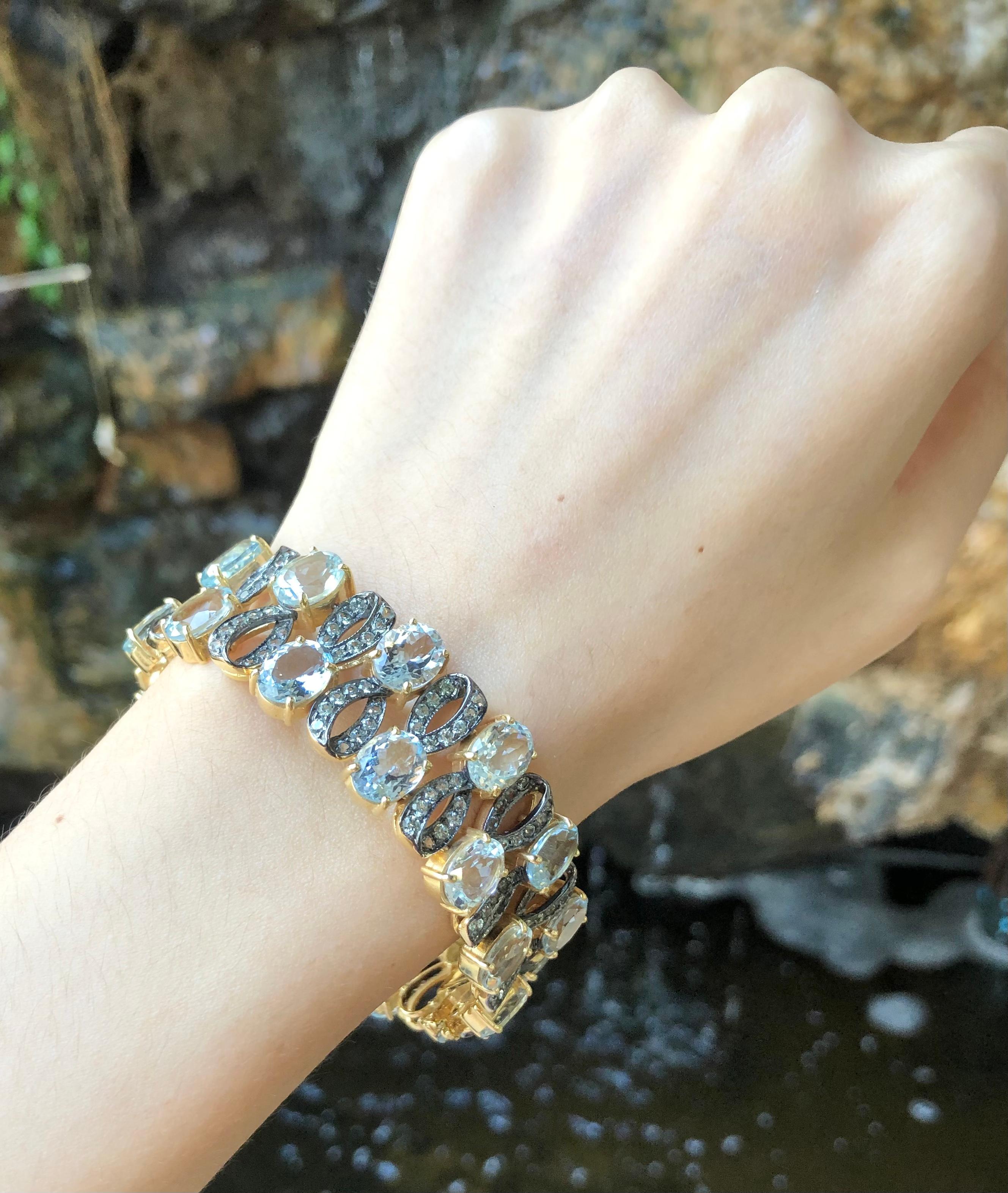 Contemporain Bracelet en or 18 carats serti d'aigue-marine et de saphirs verts en vente