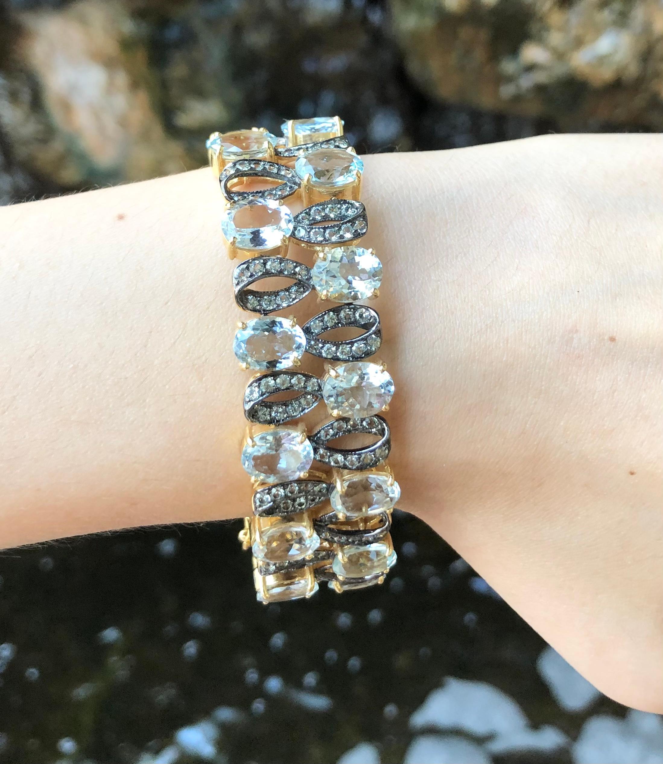 Bracelet en or 18 carats serti d'aigue-marine et de saphirs verts Pour femmes en vente