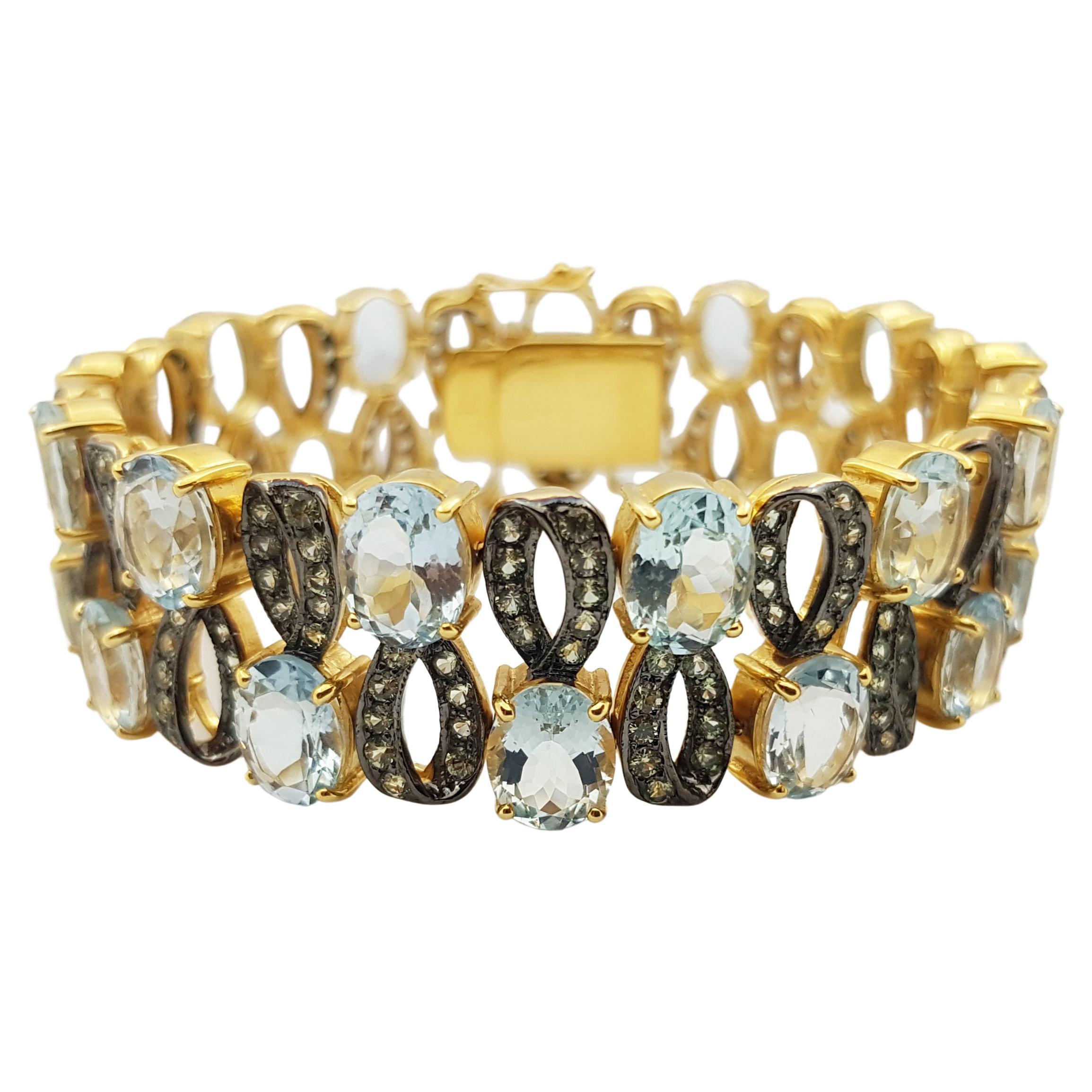 Aquamarine with Green Sapphire Bracelet Set in 18 Karat Gold Settings For Sale