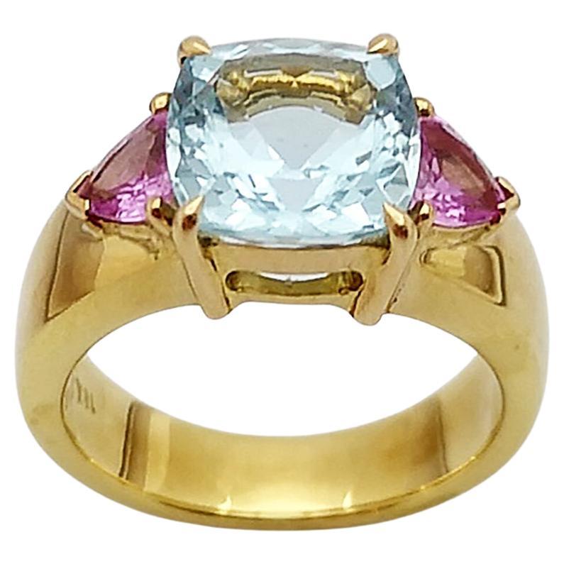 Bague en aigue-marine et saphir rose sertie dans des montures en or 18 carats en vente