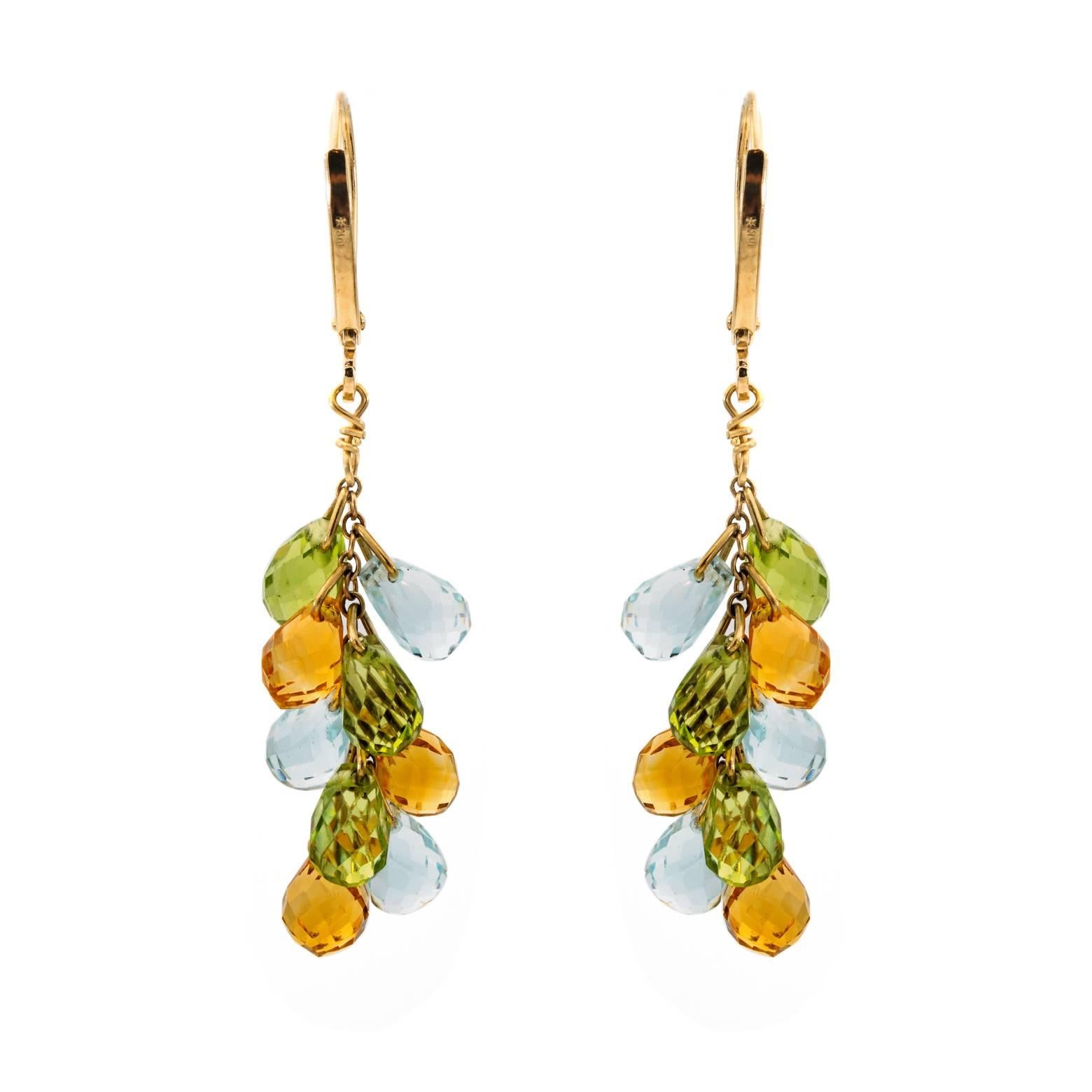 These delicate teardrop earrings are 14k gold and made with beautifully faceted teardrops in aquamarine, peridot & citrine. The earrings are fun and can be worn everyday.