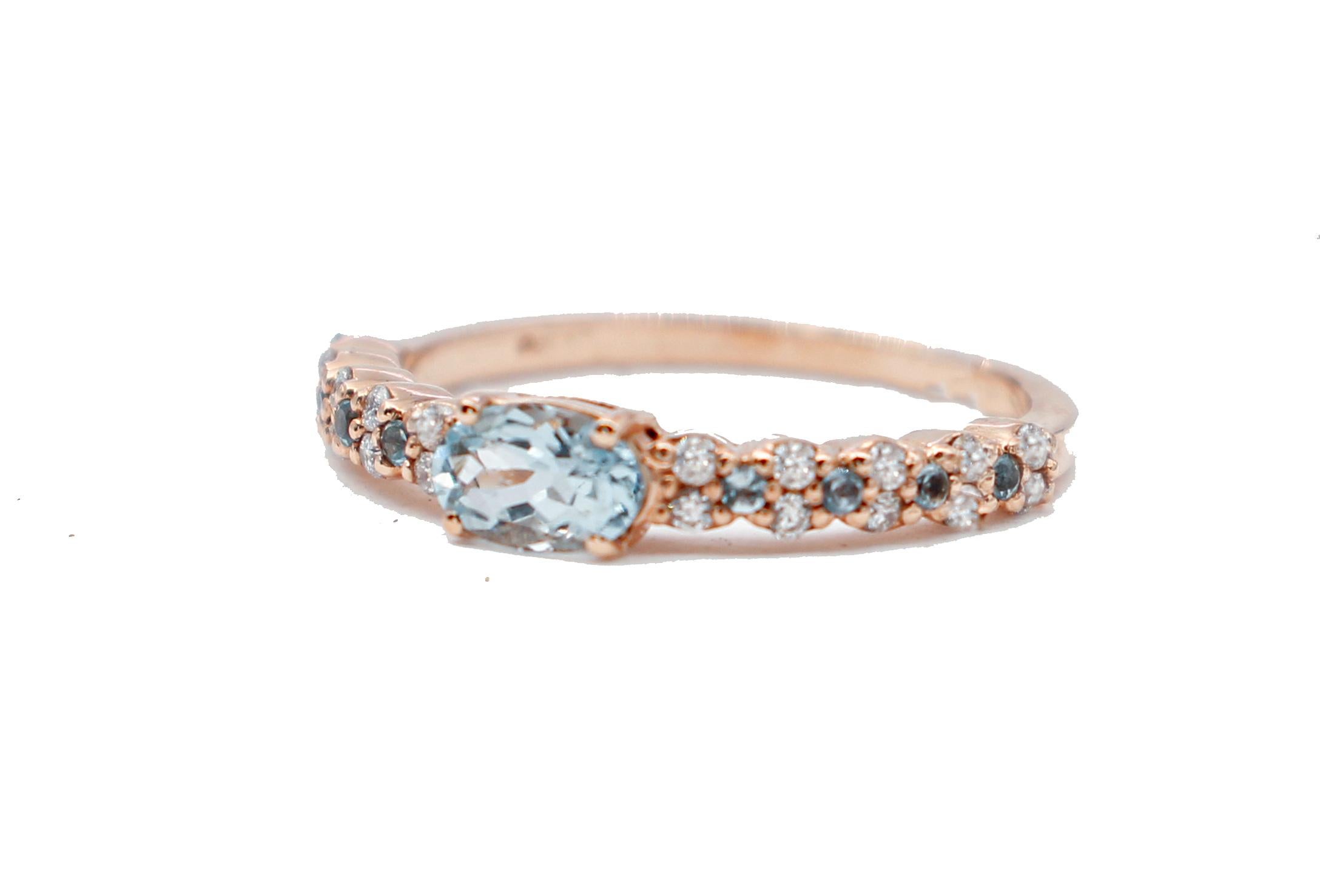 SHIPPING POLICY:
No additional costs will be added to this order.
Shipping costs will be totally covered by the seller (customs duties included). 


Gorgeous modern ring in 18 karat rose gold structure mounted with an oval aquamarine  ( 6mm x 4 mm)