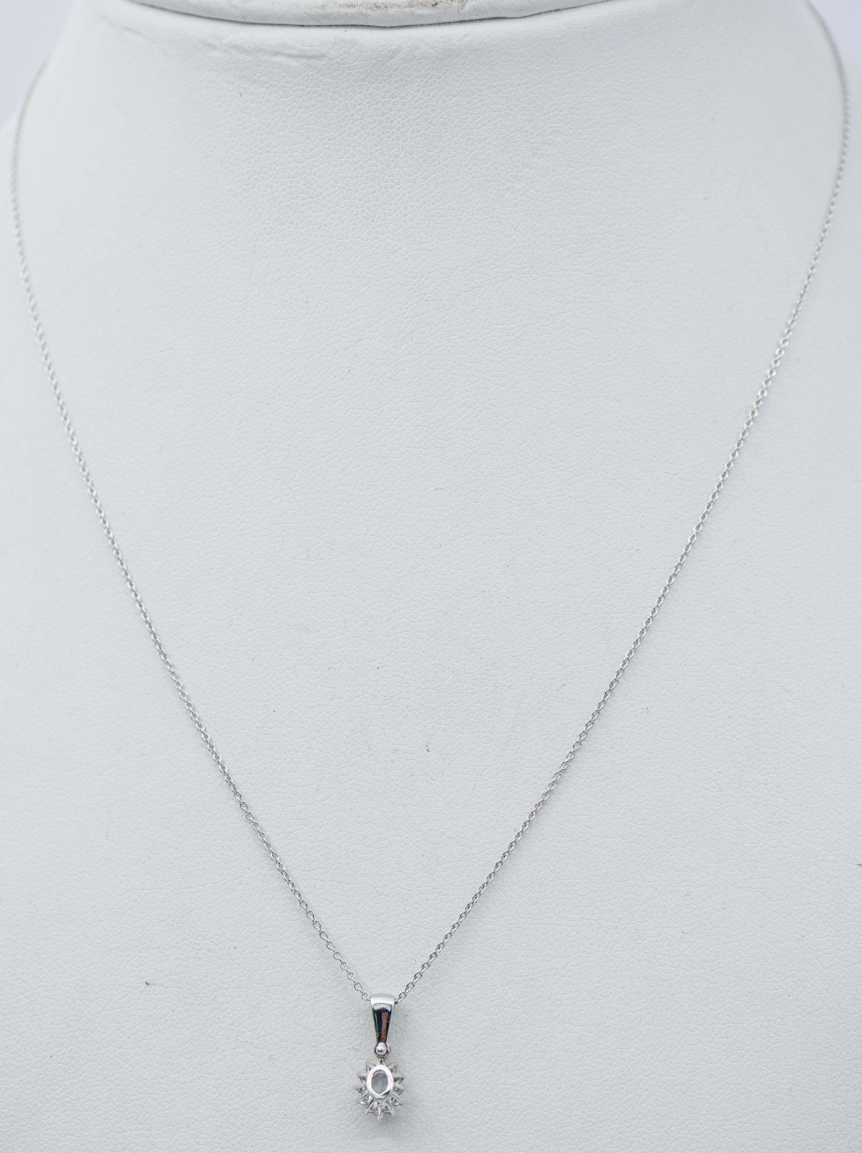 Mixed Cut Aquamarine, Diamonds, 18 Karat White Gold Pendant Necklace. For Sale