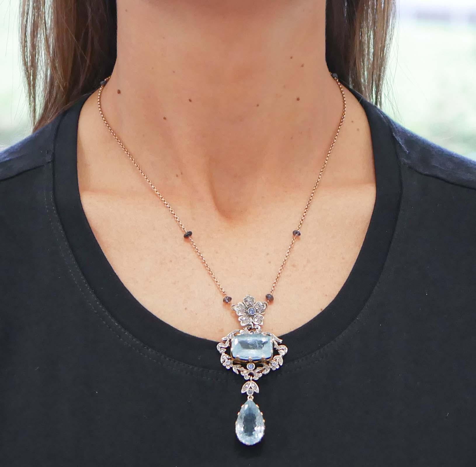Donna Acquamarina, tanzanite, zaffiri, diamanti,  Collana con ciondolo in oro e argento in vendita