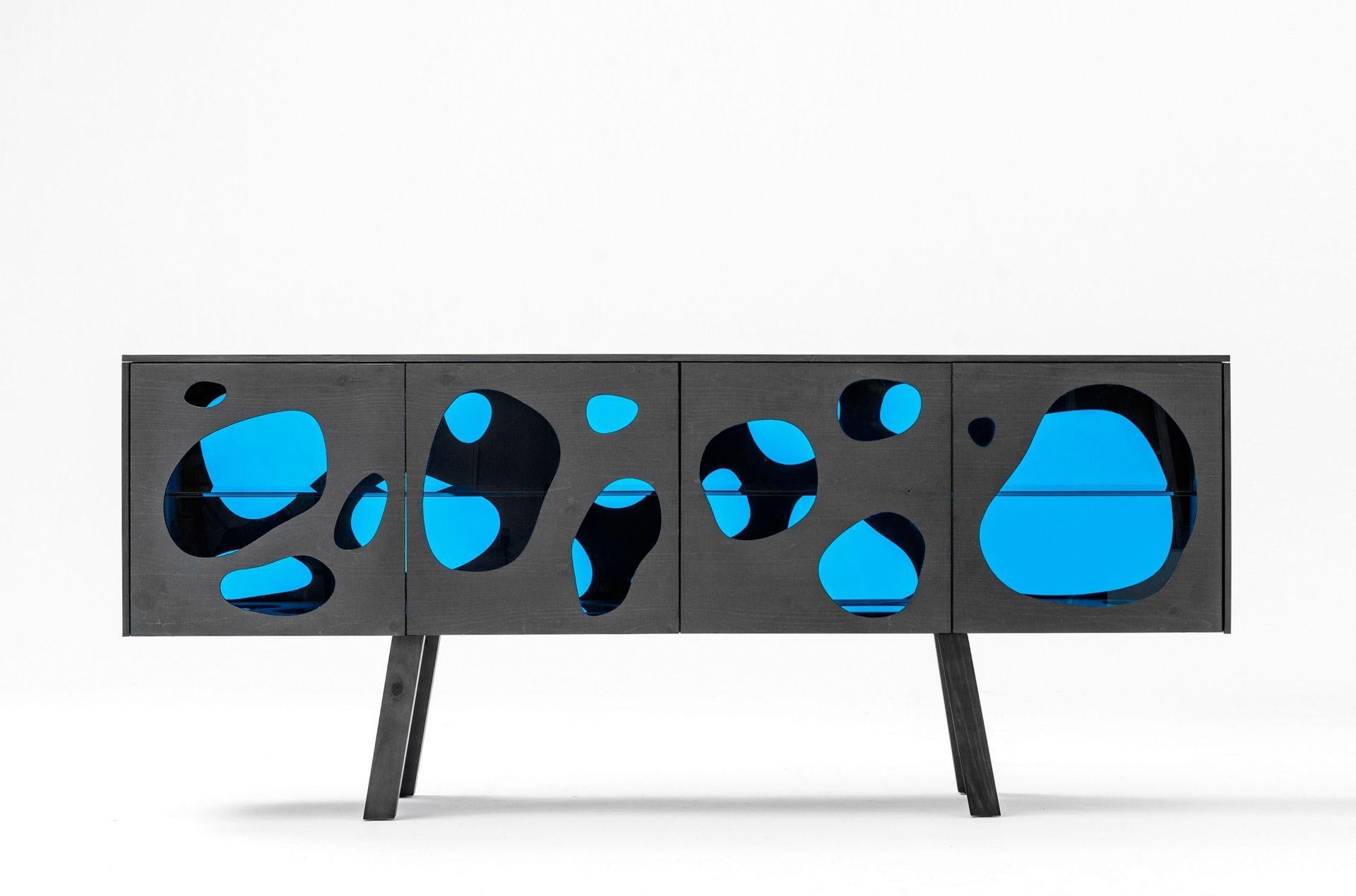 Aquario cabinet by Campana Brothers
Dimensions: D 48 x W 182 x H 76 cm 
Materials: External panels and doors are in blue glass, veneered in pine stained in grey. Legs in pine stained in grey. Interior shelves in blue glass. Veneered in Oberflex.