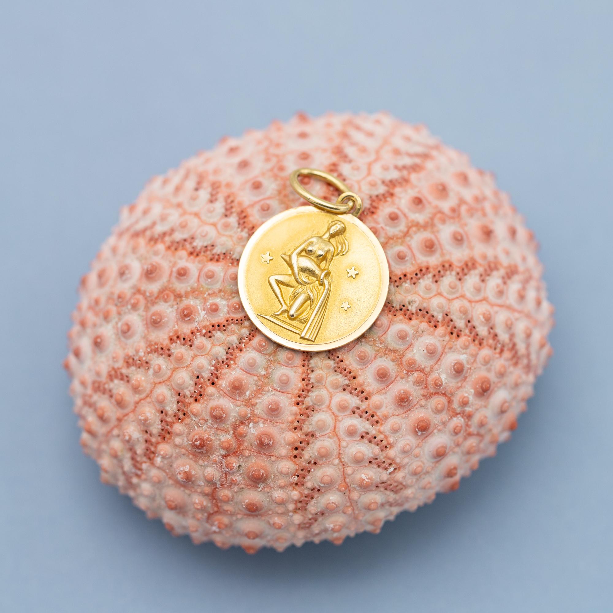 For sale is this vintage charm depicting an Aquarius, the eleventh astrological sign in the zodiac. This Constellation Star Sign Pendant is associated with the birth dates between 22 January and 21 February. This pretty charm is hallmarked with a