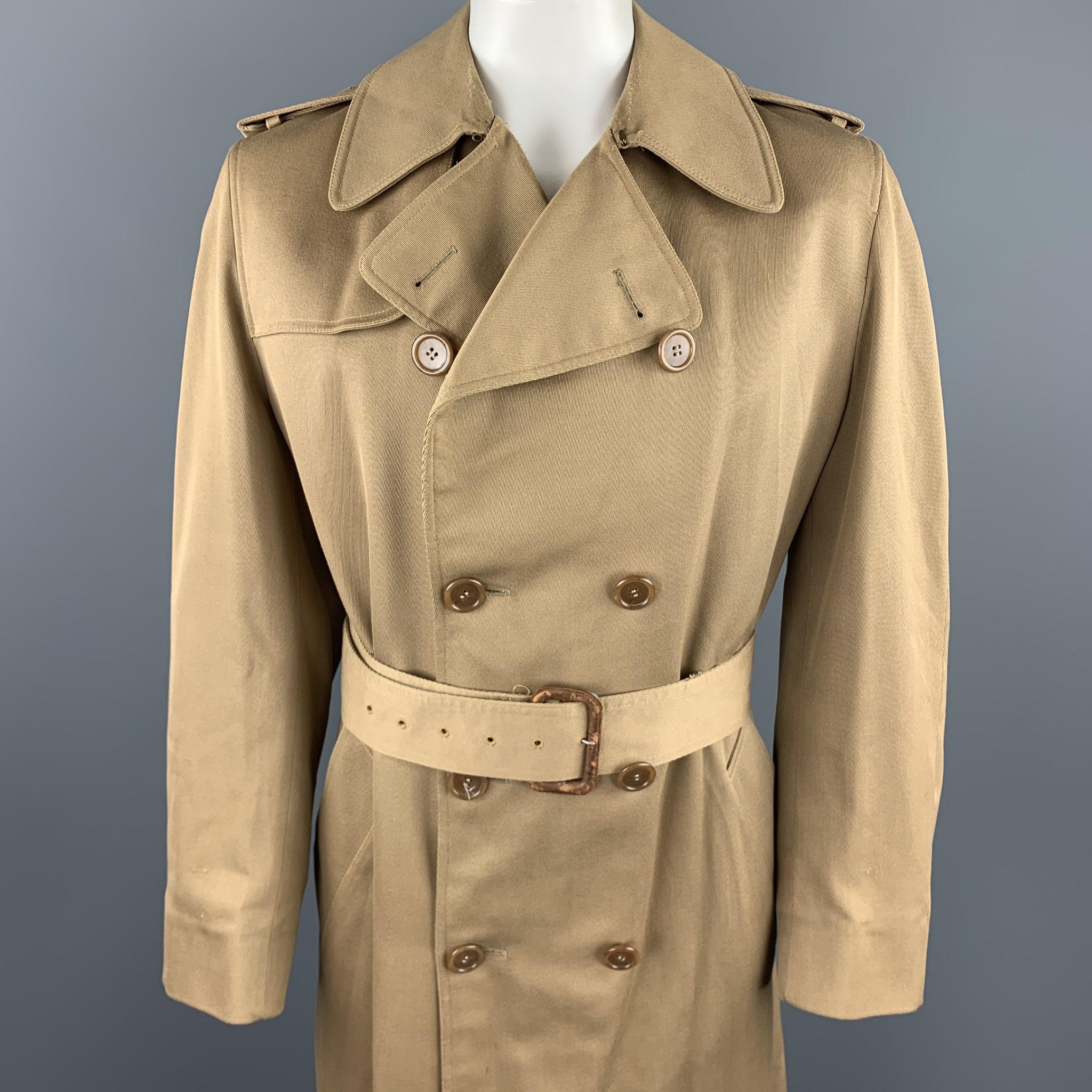 AQUASCUTUM trenchcoat comes in a khaki cotton / polyester with a full liner featuring a belted style, notch lapel, front pockets, epaulettes, and a double breasted closure. Made in Canada.

Good Pre-Owned Condition.
Marked: