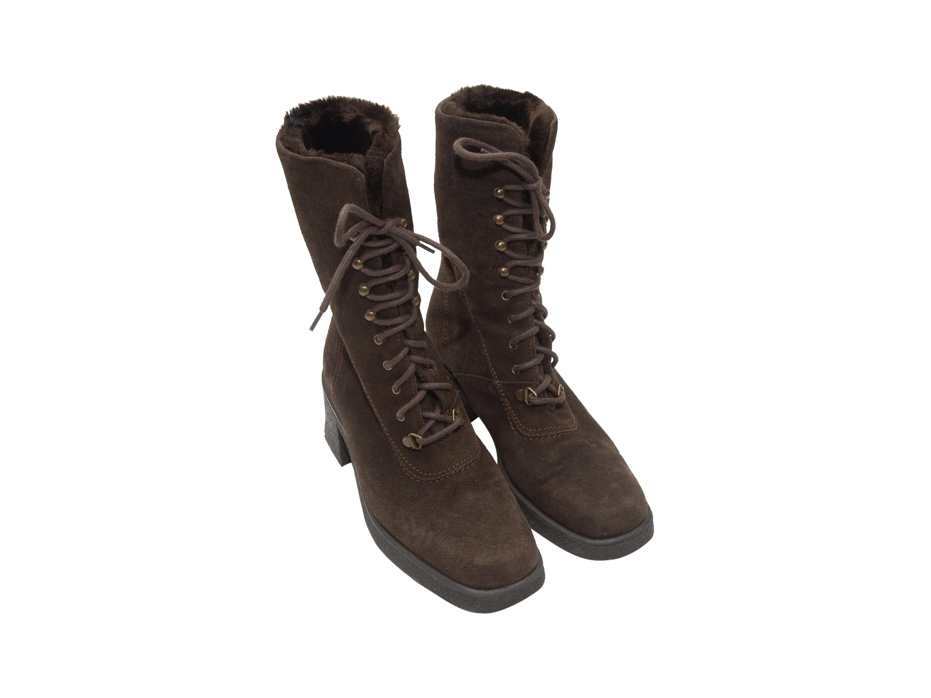 Product details: Brown suede square-toe boots by Aquatalia. Shearling lining. Lace-up tie closures at tops. 2