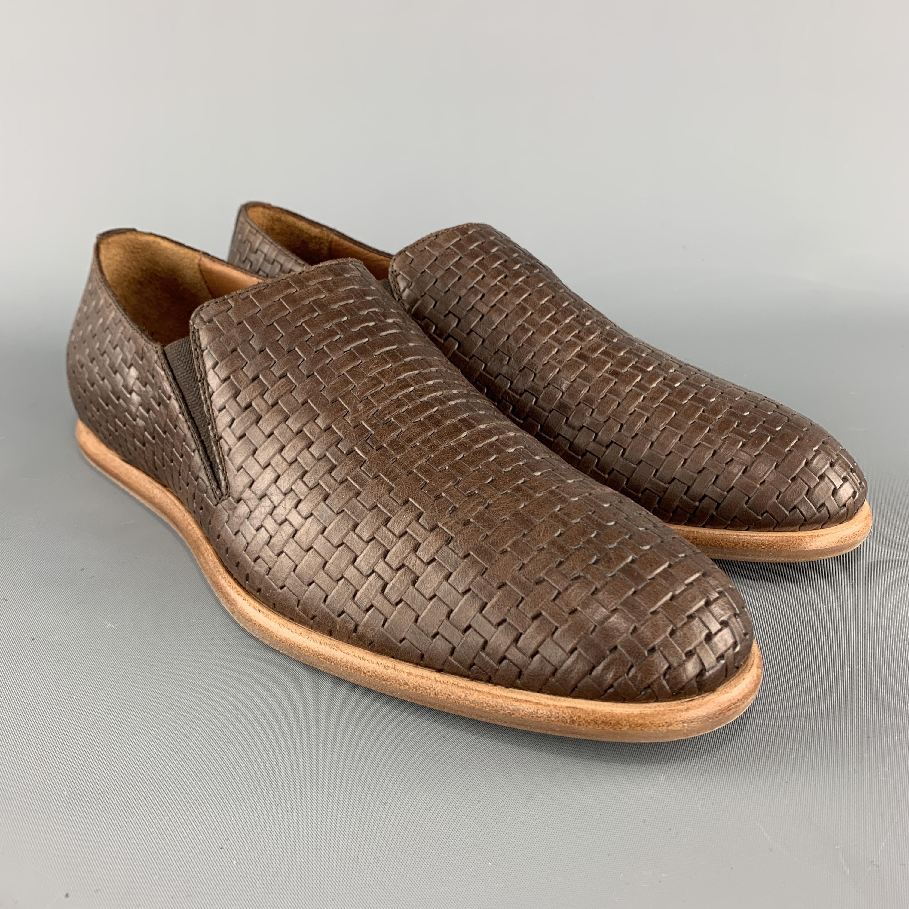 AQUATALIA slip on loafers come in brown woven leather with a tan sole. Made in Italy.

Brand New.
Marked: USA 10

Outsole: 12 x 4.25 in.