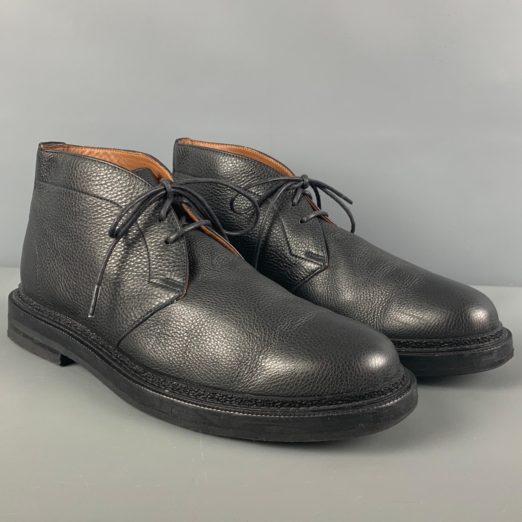 AQUATALIA boots comes in a black pebble grain leather featuring a chukka style, round toe, and a lace up closure. Made in Italy. 

Very Good Pre-Owned Condition.
Marked: 10.5 M
Original Retail Price: $450.00

Measurements:

Length: 12.5 in.
Width: