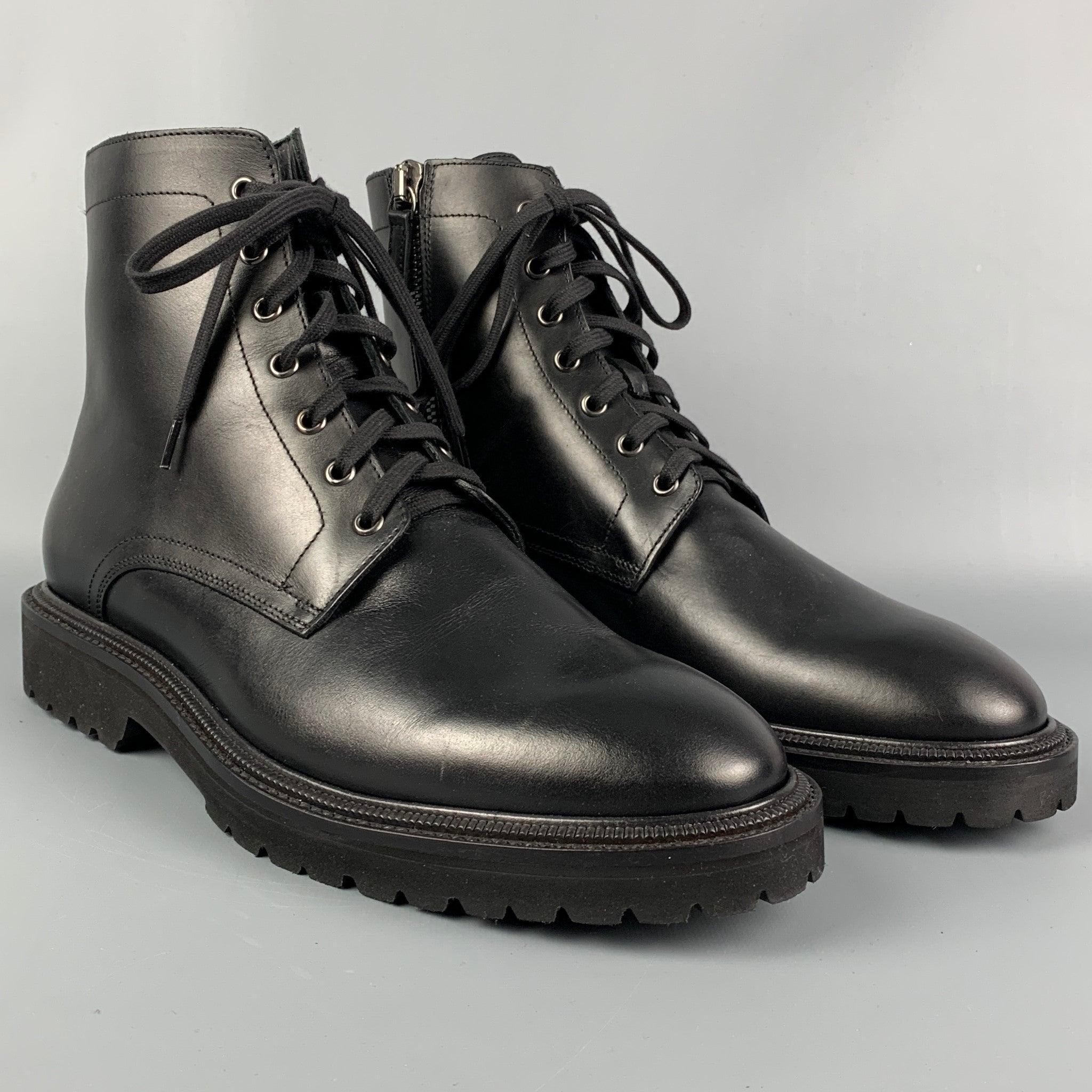 AQUATALIA ankle boots comes in a black leather featuring a rubber sole and a side zipper closure. Made in Italy.
New Without Tags.
 

Marked:  
11  

Measurements: 
  Length: 12.5 inches  Width: 4.5 inches  Height: 6 inches 
  
  
 
Reference: