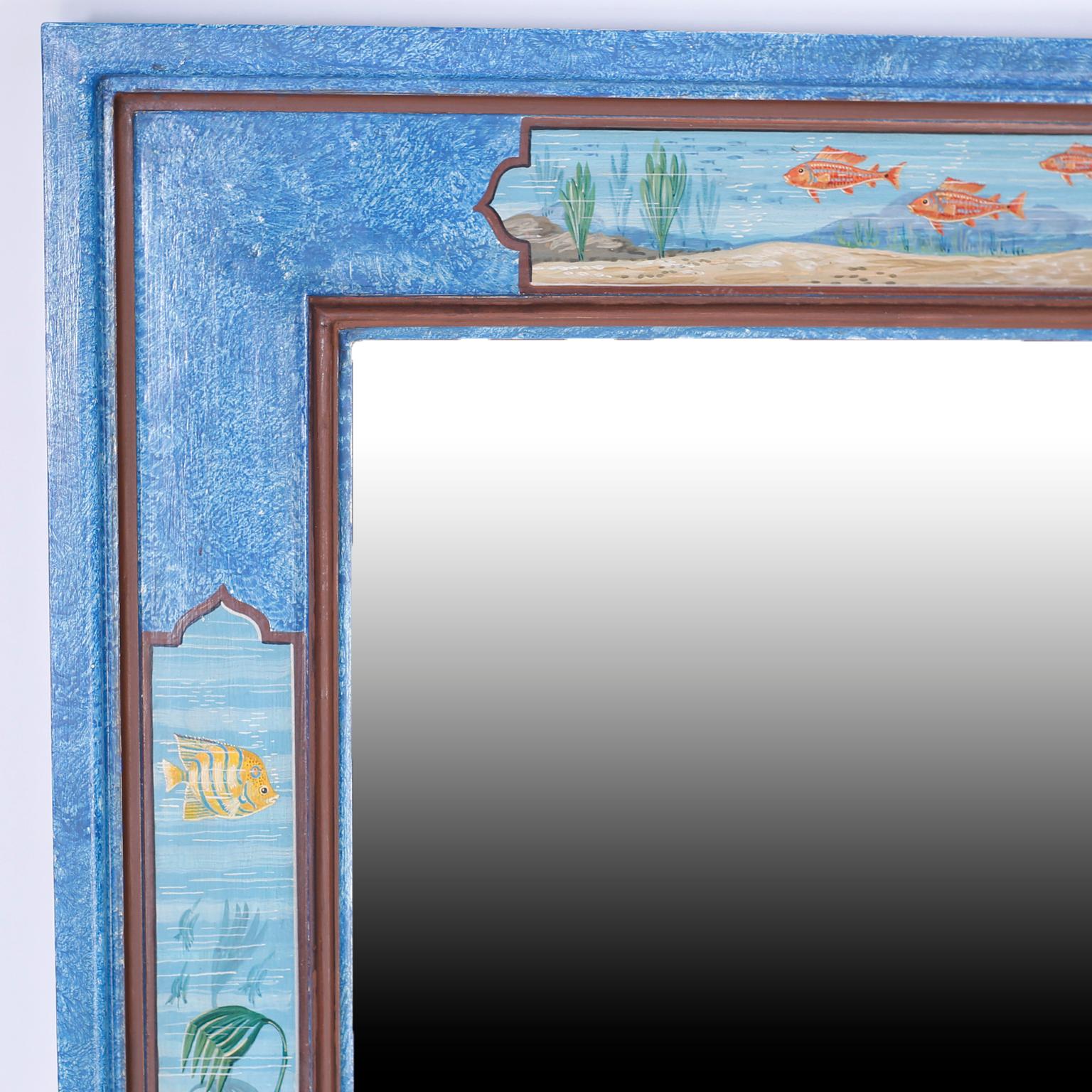 Wood mirror hand decorated with aquatic scenes on a blue background. Signed Ditta Pieri & Sons.
   