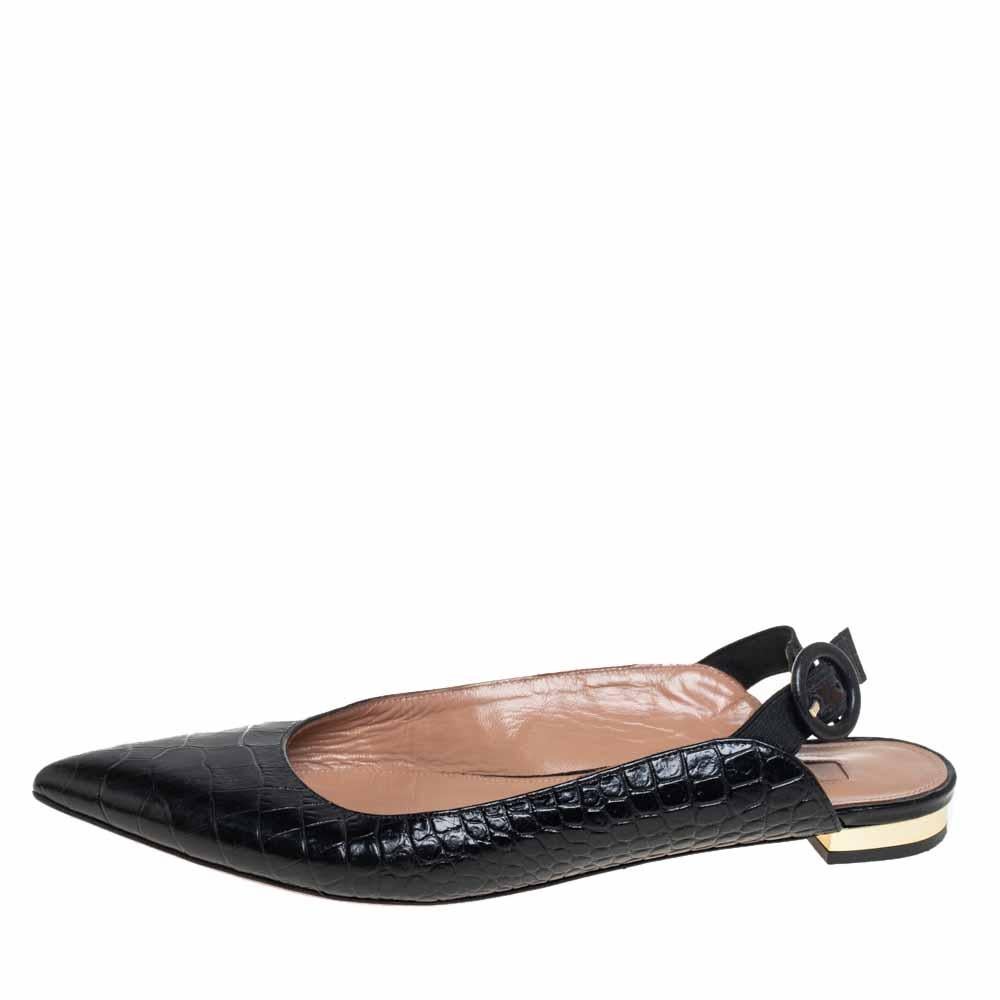 These chic sandals by Aquazzura are the most versatile pair you can possibly own. These croc-embossed leather sandals have pointed toes, slingbacks, and sturdy soles. These sandals are lined with the finest quality leather and are durable. You need