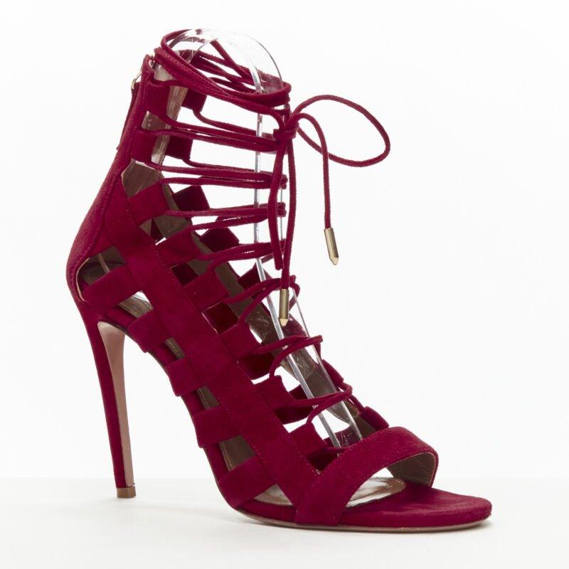 AQUAZZURA Amazon dark red suede lace up sandals high heels EU38
Reference: KEDG/A00198
Brand: Aquazzura
Model: Amazon
Material: Suede
Color: Red
Pattern: Solid
Closure: Zip
Lining:  Leather
Extra Details: Gold-tone zip back closure.
Made in: