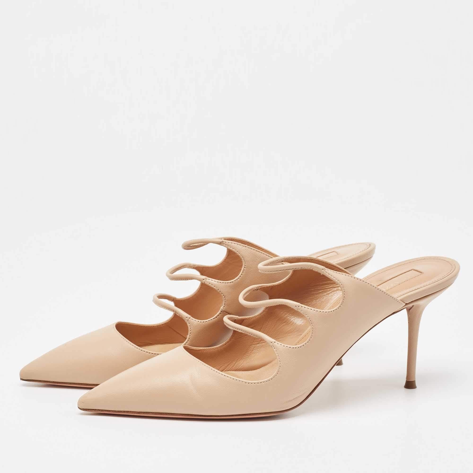 The ease of slipping into your shoes as you head out and taking them off once you're home is elevated with mules. These Aquazzura mules for women bring the same comfort with a lot of style.