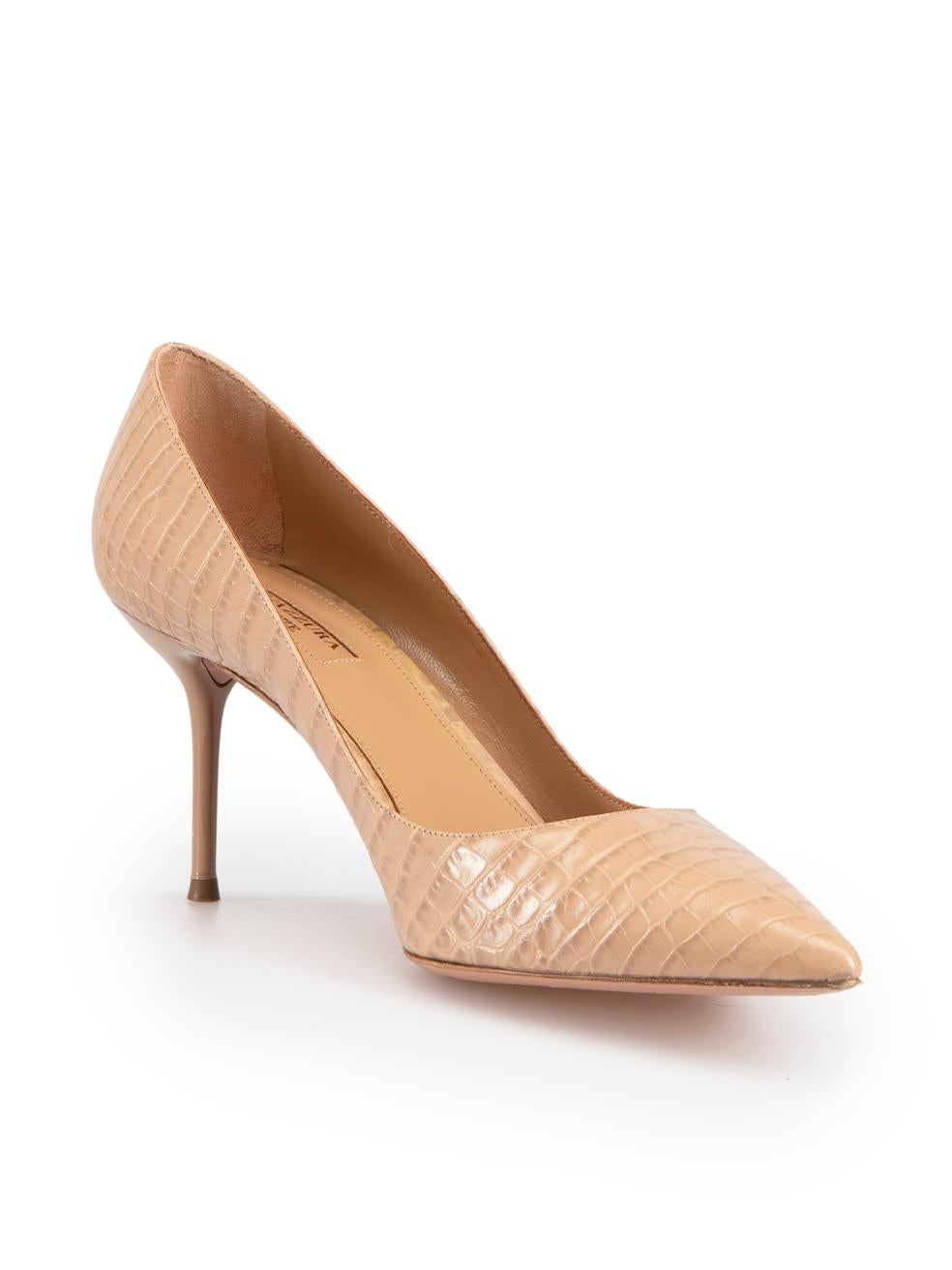 CONDITION is Very good. Minimal wear to shoes is evident. Minimal wear to the left shoe heel with tiny mark on this used Aquazzura designer resale item. These shoes come with original box and dust bag.

Details
Purist
Beige
Leather
Heels
Croc