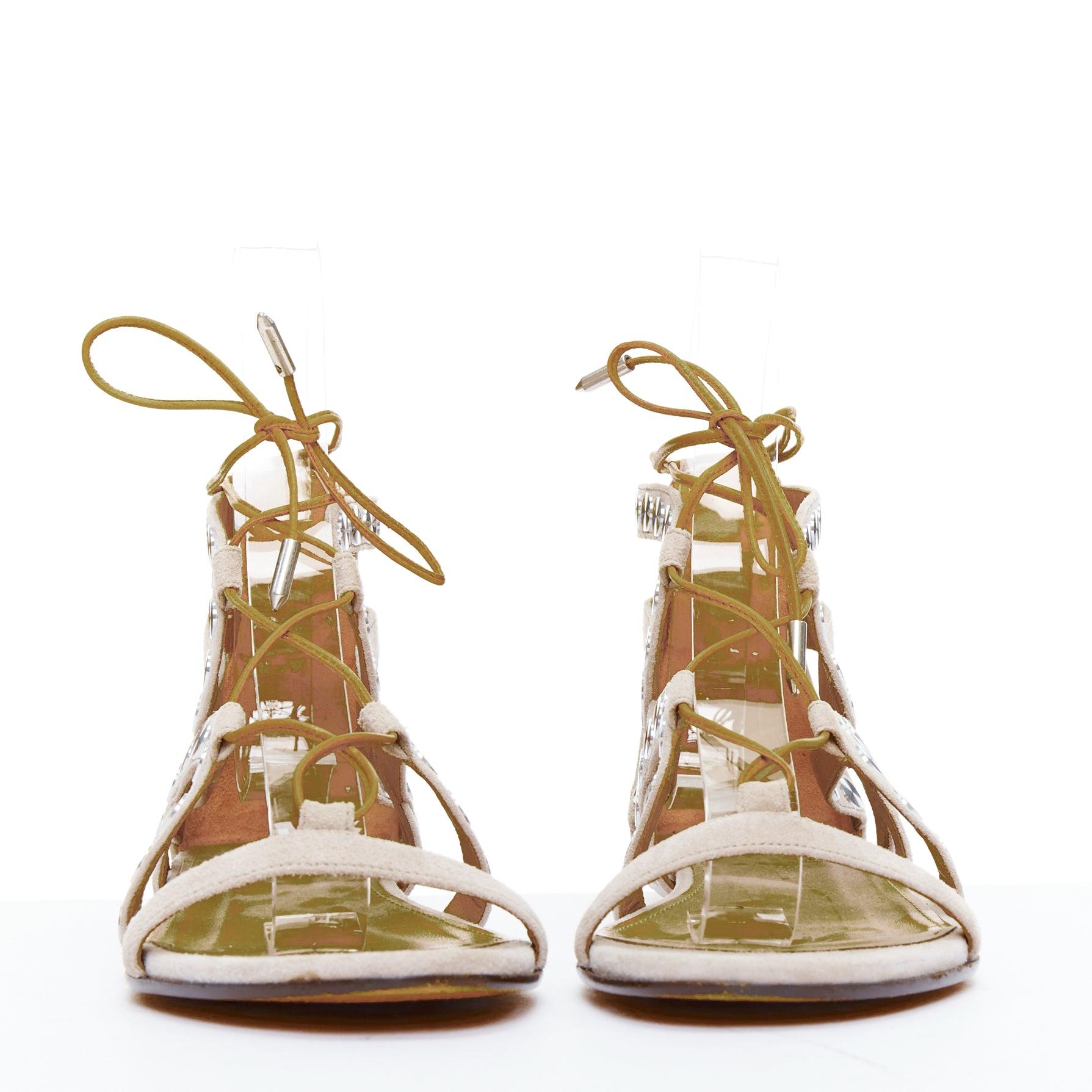 Beige AQUAZZURA sandali gladiatore in pelle beige con borchie a forma di disco d'argento EU36 in vendita