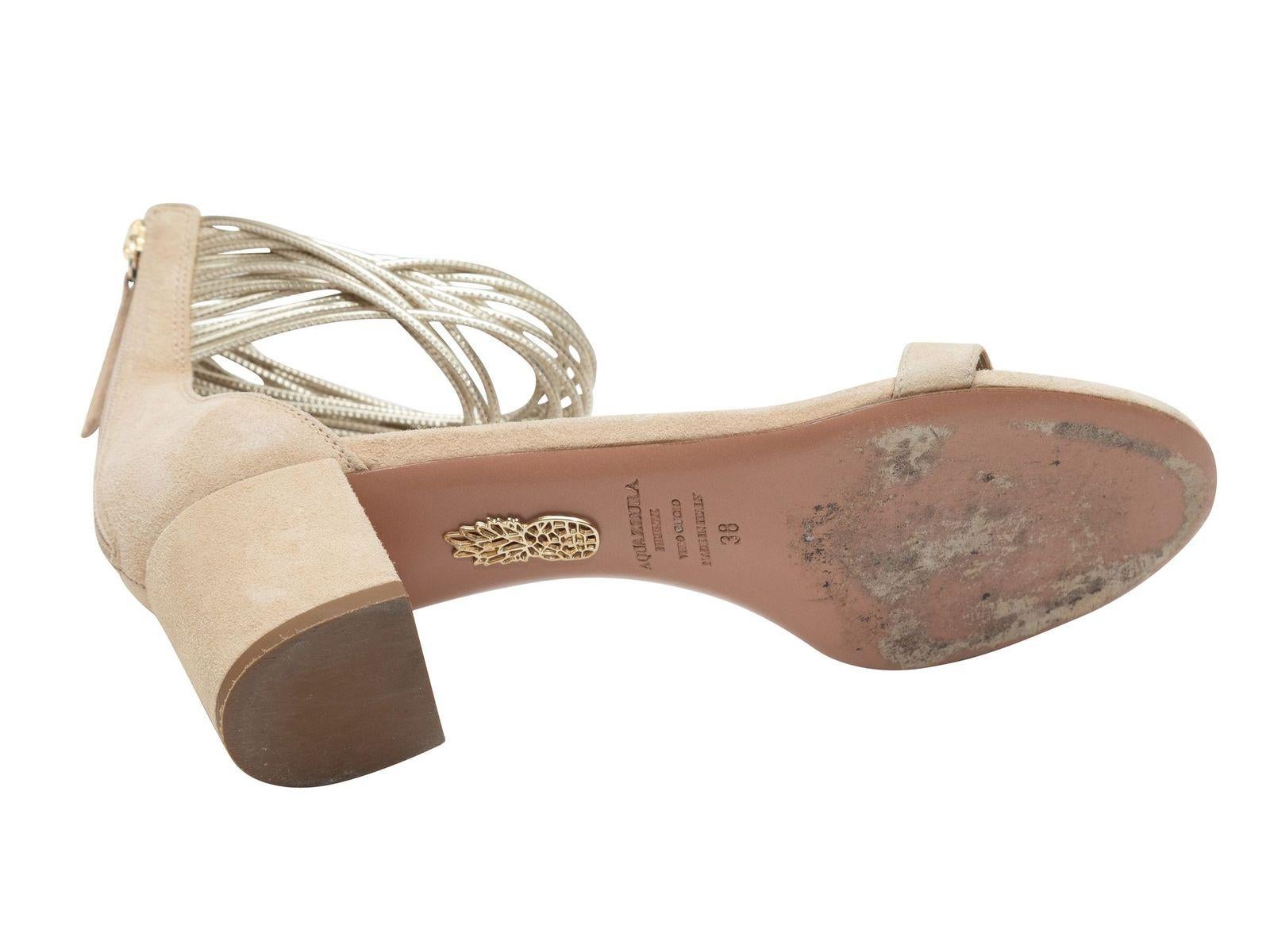 Product Details: Beige suede ankle strap sandals by Aquazzura. Block heels. Zip closures at counters. 2