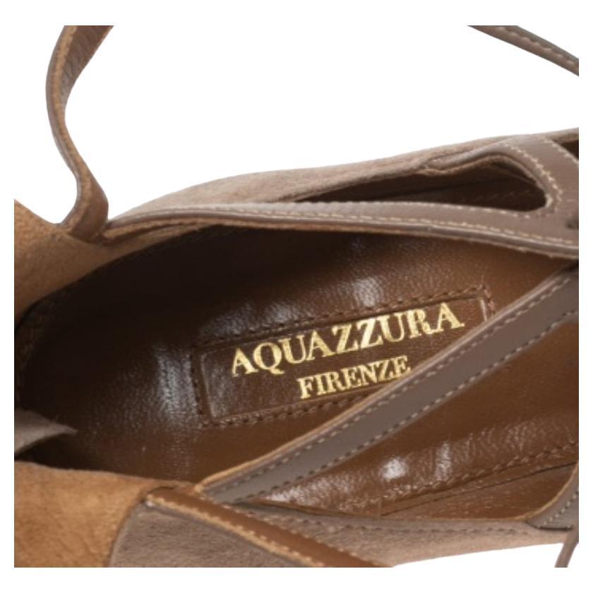 Beautiful and sophisticated, these Dancer ballet flats from Aquazzura are a perfect alternative to your party heels. Rendered in beige suede, the pair is styled with round toes and crisscross laces that are meant to be tied at the back of the ankle.