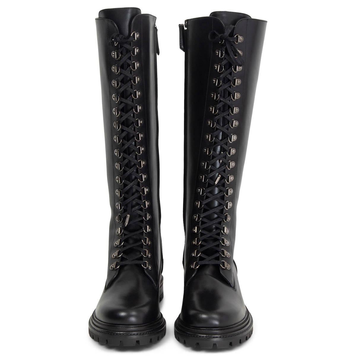 100% authentic Aquazzura lace-up knee high combat boots in black smooth calfskin and gunmetal hardware. Open with a zipper on the inside and come with a chunky black rubber sole. Brand new. 

Measurements
Imprinted Size	38.5
Shoe Size	38.5
Inside