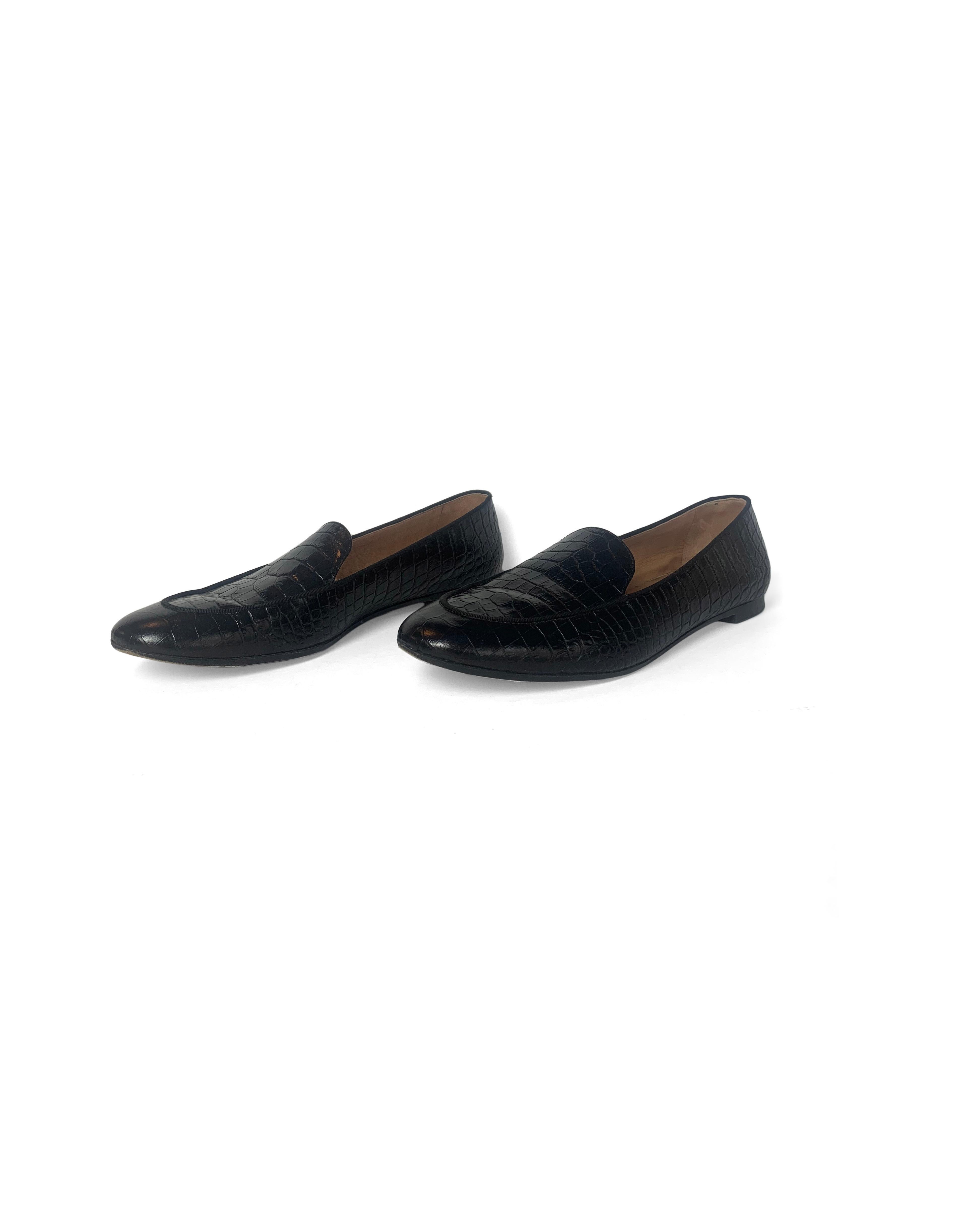 Aquazzura Black Purist Glossed Crocodile-Effect Leather Loafers
Made In: Italy
Year of Production: 2019-2020
Color: Black
Materials: Embossed glossed calf leather and grosgrain
Closure/Opening: Slip on
Overall Condition: Excellent pre-owned
