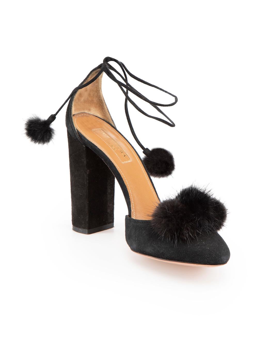 CONDITION is Very good. Minimal wear to heels is evident. Minimal wear with abrasions to the leather of both heels and toes on this used Aquazzura designer resale item.
 
 Details
 Black
 Suede
 Heels
 Almond toe
 Fur pom pom accent
 High block