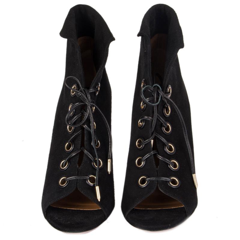 100% authentic Aquazzura peep-toe lace-up ankle boots in black suede. Brand new.

Measurements
Imprinted Size	39.5
Shoe Size	39.5
Inside Sole	25.5cm (9.9in)
Width	8cm (3.1in)
Heel	11cm (4.3in)
Shaft	12cm (4.7in)
Hardware	Antique Gold-Tone

All our