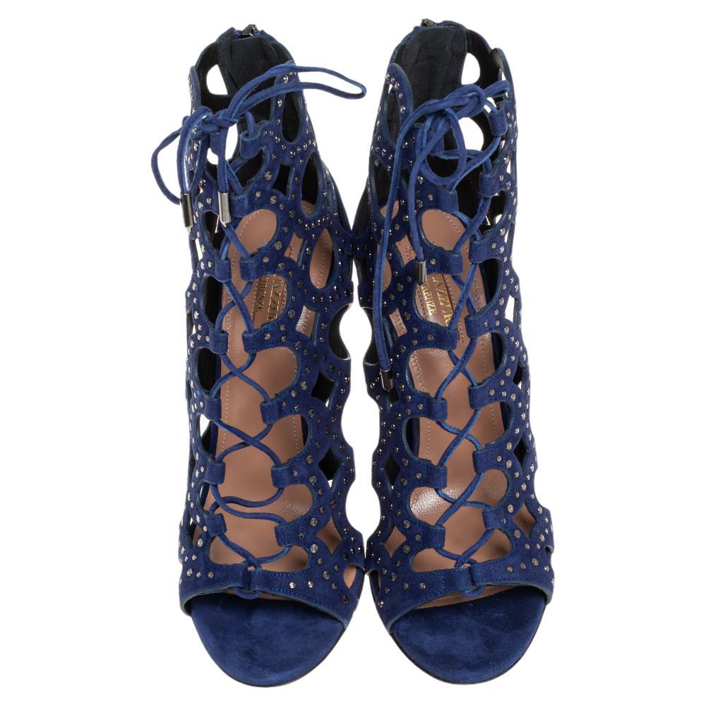 Crafted exquisitely from suede and designed with cutouts, these Aquazzura booties were built to lift your outfits and your spirits. Strings are laced perfectly at the front, zippers are detailed on the counters, while beautifully-sculpted 10.5 cm