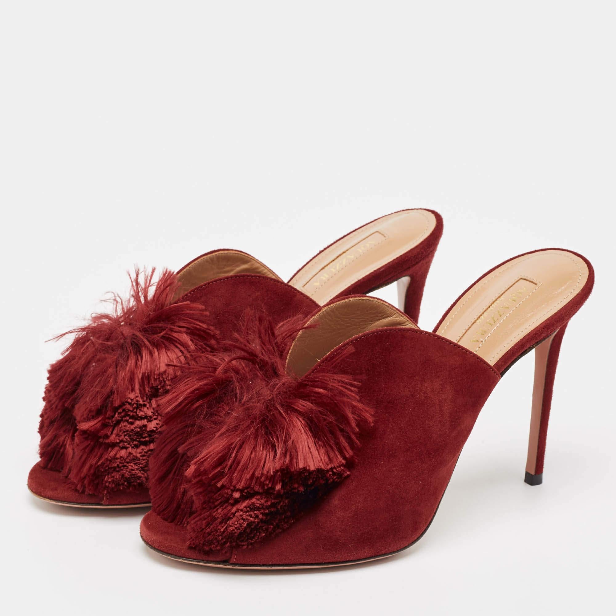 A pair of red heels is a must have in every collection and when the design is by Aquazzura it is sure to add a statement of luxury to your wardrobe. These mules are sure to delight
