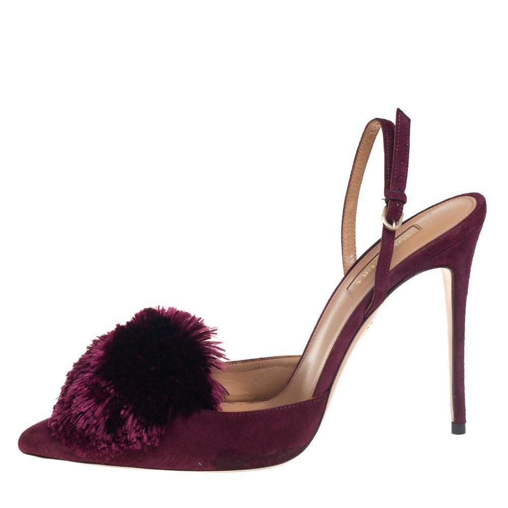 Treat your feet to this gorgeous pair of Powder Puff sandals from Aquazzura. Crafted from burgundy suede, this pair features pointed toes, 11.5 cm heels, and buckled slingbacks. The insoles are lined with leather and the stunning pair is complete
