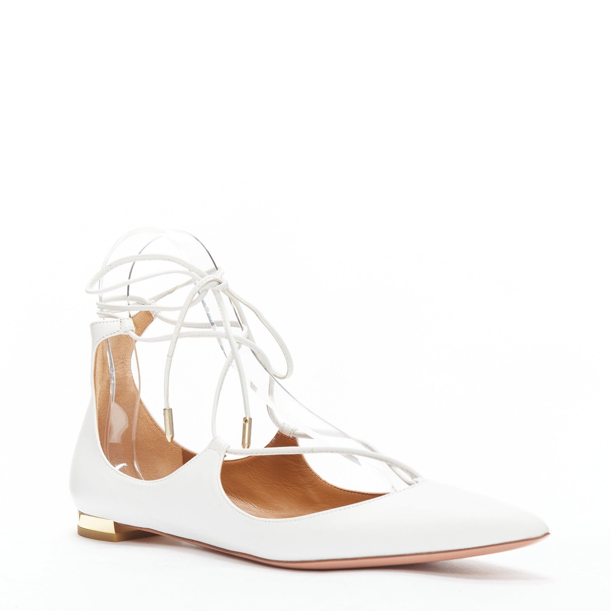 AQUAZZURA Christy white leather lace up pointed flats EU37.5A
Reference: SNKO/A00373
Brand: Aquazzura
Model: Christy
Material: Leather
Color: White, Gold
Pattern: Solid
Closure: Lace Up
Lining: Nude Leather
Made in: Italy

CONDITION:
Condition: New