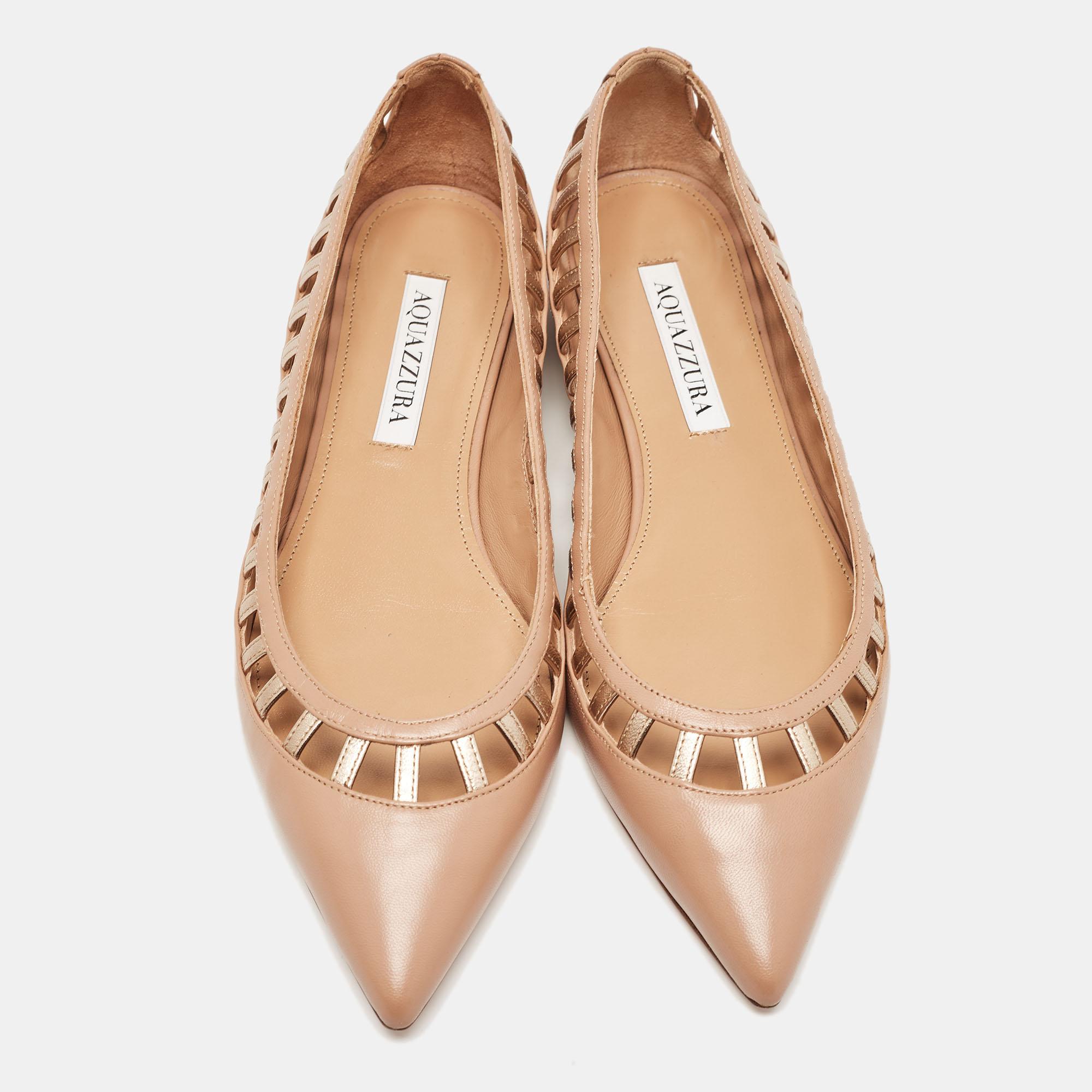 These ballet flats by Aquazzura are comfortable and chic to be matched with everything from a shirt dress to skinny jeans. Crafted from leather, they feature pointed toes and cut-out details.

Includes: Original Box

