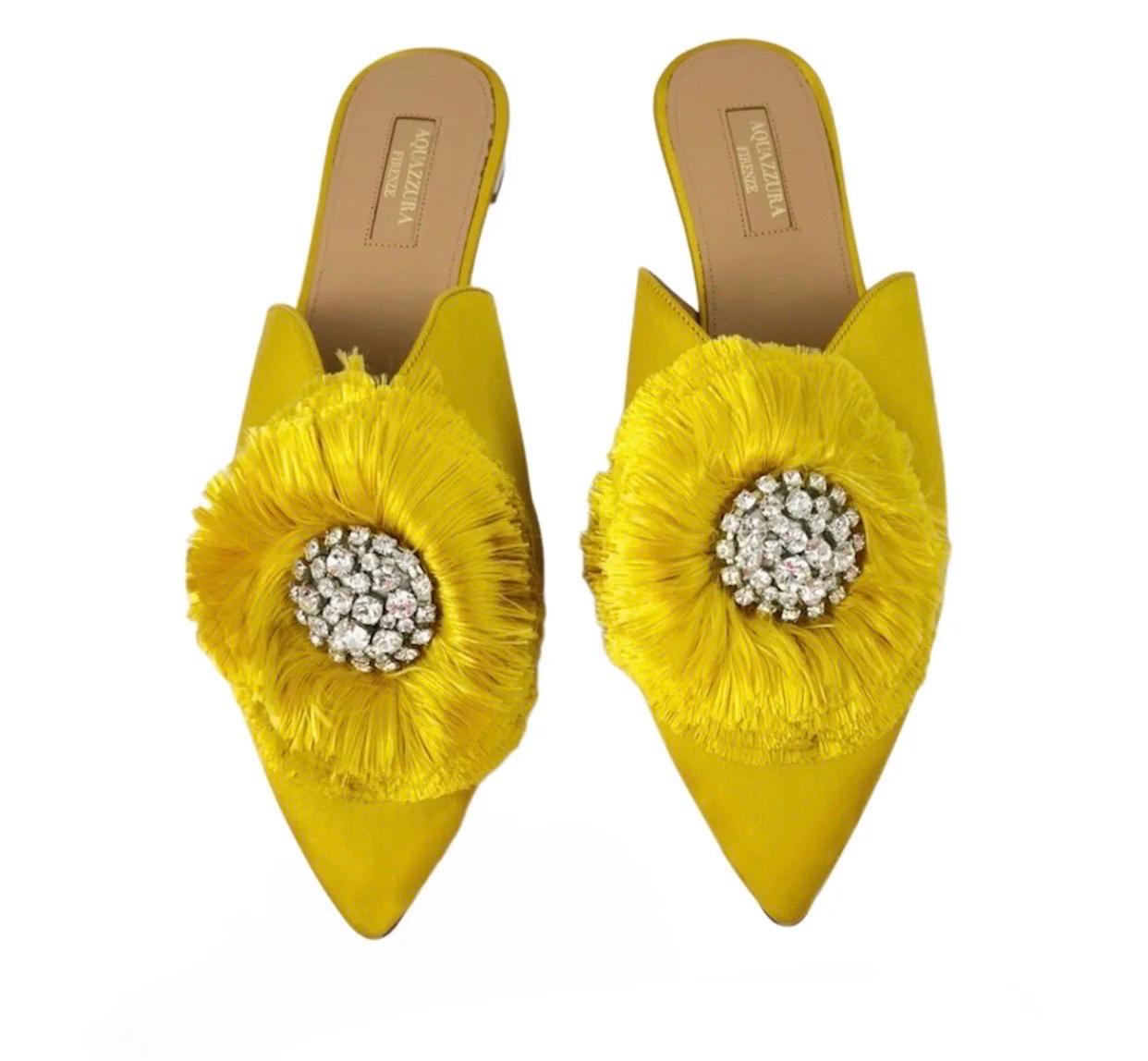 Aquazzura Mustard yellow satin pointed-toe mules, with crystal-studded pom-pom detail. 

Material: Satin
Size: EU 38.5
Overall Condition: Excellent
Interior Condition: signs of use 
Exterior Condition: Very light visible signs of use
*Includes