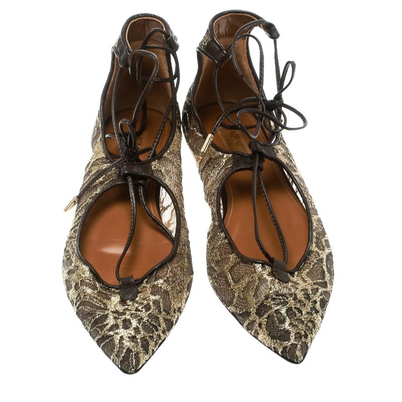 You're sure to win hearts with these flats from Aquazzura. Arriving in a gorgeous lace exterior, the flats carry pointed toes, laces ups and comfortable leather insoles. They are sweet in appeal and comfortable to wear all day.

Includes: The Luxury