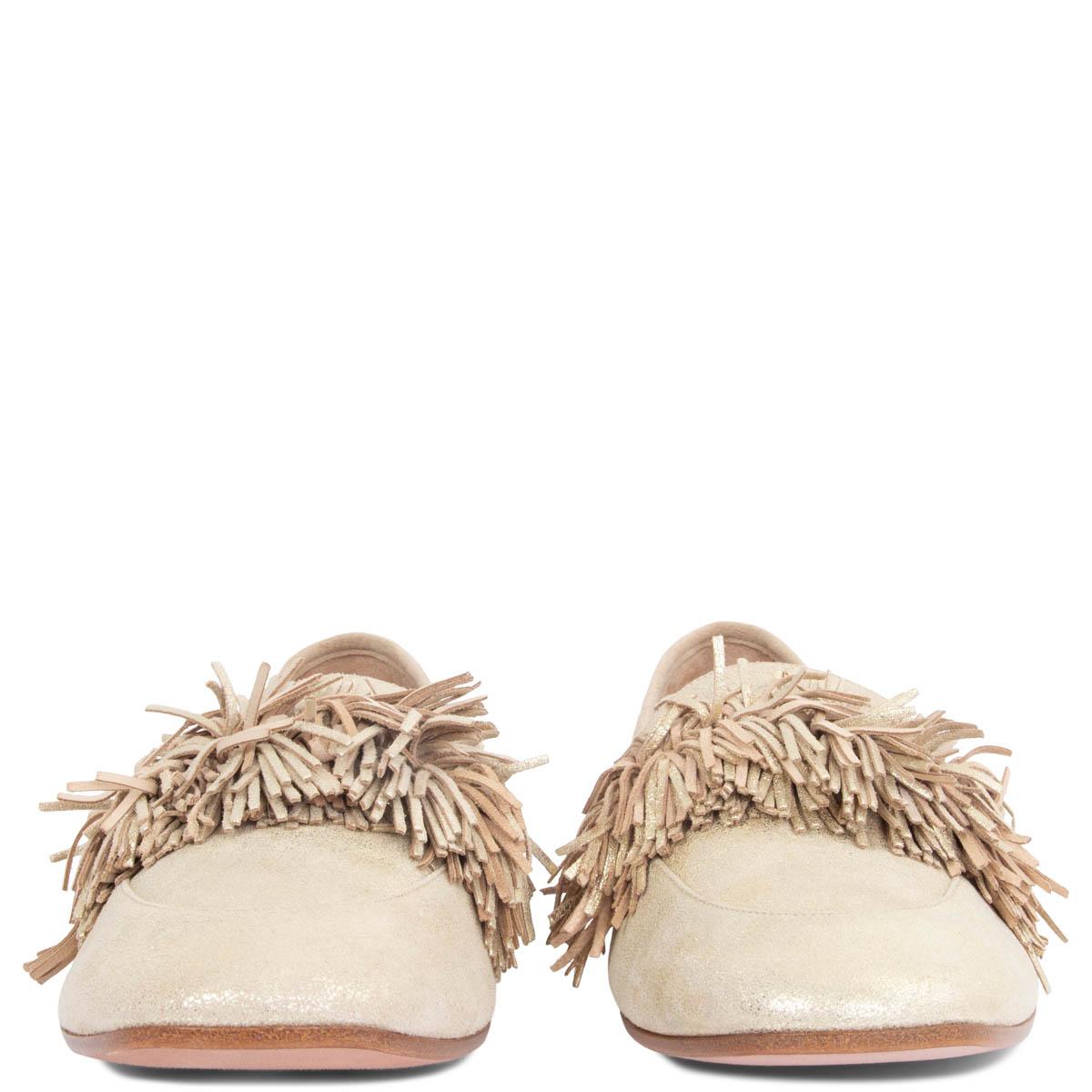 100% authentic Aquazzura Wild Thing fringe loafers in metallic gold and beige suede calfskin. Brand new. Come with dust bag. 

Measurements
Imprinted Size	40 (run 1 size smaller)
Shoe Size	39
Inside Sole	26cm (10.1in)
Width	8cm (3.1in)

All our