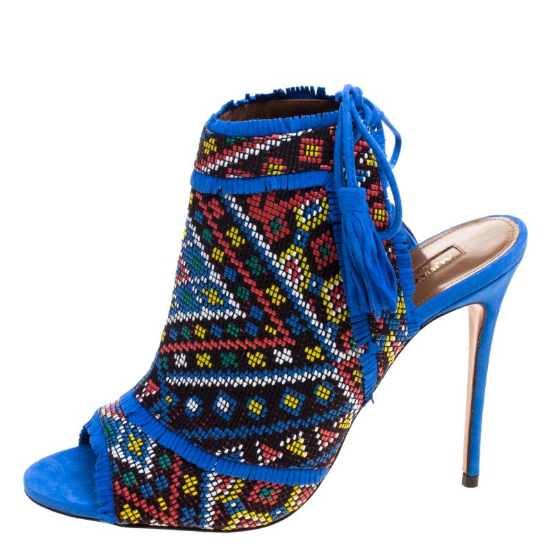 Dress your feet up in the brightly coloured and designed sandals that your high fashion needs demand. The Aquazzura Multicolor Embroidered Fabric and Suede Colorado Peep Toe Sandals ooze style from every stitch on that suede body that stands propped