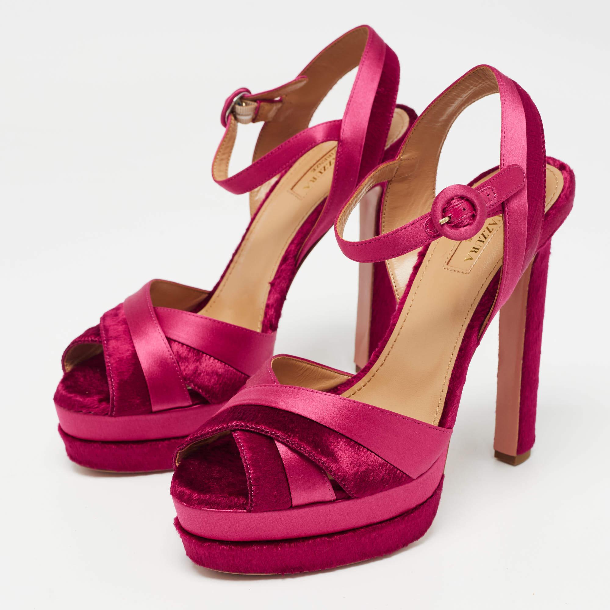 This pair by Aquazzura will complement your dresses and casual separates perfectly. They are crafted from satin as well as velvet and designed in a grand pink. They feature ankle straps with side buckle fastening open toes and platforms assisting