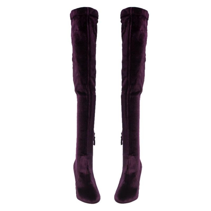 Boots are an essential part of your winter wardrobe, and these Aquazzura So Me boots crafted from purple velvet are effortlessly stylish. Knee-high with a comfortable design, the shape and cut of the material are gently equestrian. Sturdy soled with