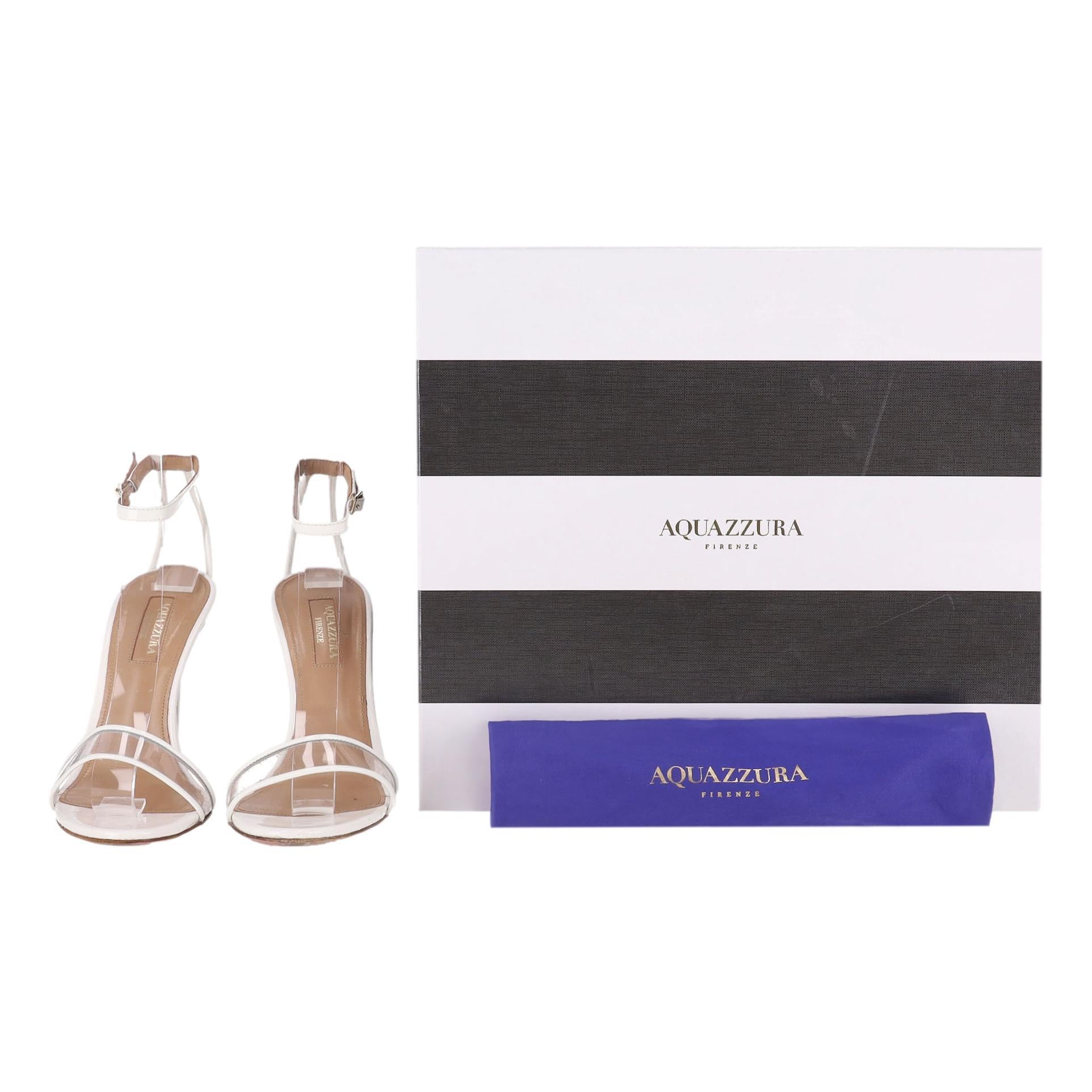 Aquazzura - Sandales en cuir verni à lanières PVC

Talons blancs en cuir verni brillant avec une seule bride en PVC.

Il est doté d'un talon aiguille et d'une bride réglable à la cheville.

Rrp Approx. £600

Taille - 36

Condit - Bon/Très bon
