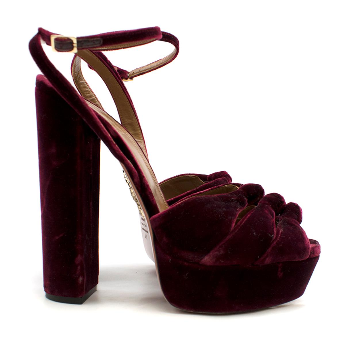 Mira Velvet Ankle-Strap Platform Sandals

- Ruby Red Heeled Sandals 
- Velvet block heels 
- Platformed
- Ankle strapped
- Knot accent at front
- Leather sole 

Please note, these items are pre-owned and may show some signs of storage, even when