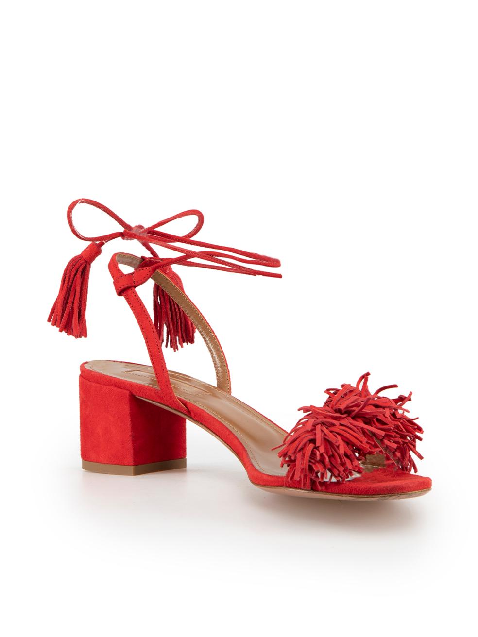 CONDITION is Very good. Minimal wear to shoes is evident. Minimal wear to the left shoe heel with very light abrasion to the suede on this used Aquazzura designer resale item.
 
 Details
 Red
 Suede
 Strappy sandals
 Fringed accent
 Tie strap