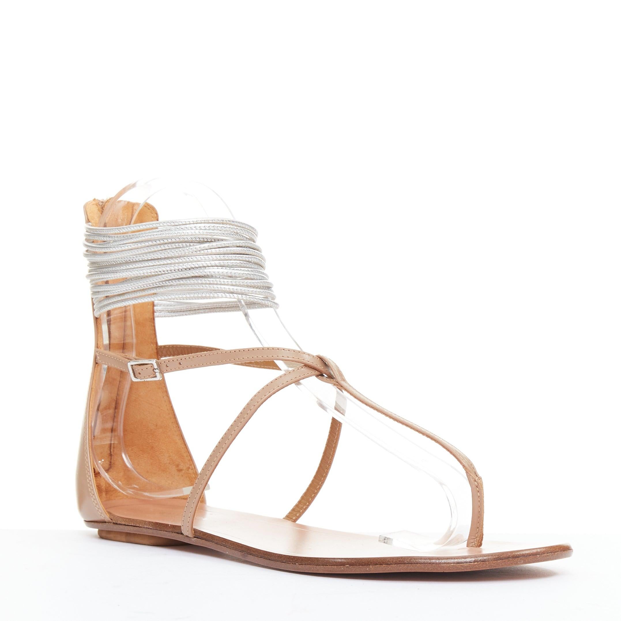AQUAZZURA Spin Me Around silberne Spule nackt Leder Gladiator flache Sandalen EU37.5
Referenz: SNKO/A00636
Marke: Aquazzura
Modell: Spin Me Around
MATERIAL: Leder
Farbe: Silber, Nackt
Muster: Solide
Verschluss: Reißverschluss
Innenfutter: Nacktes