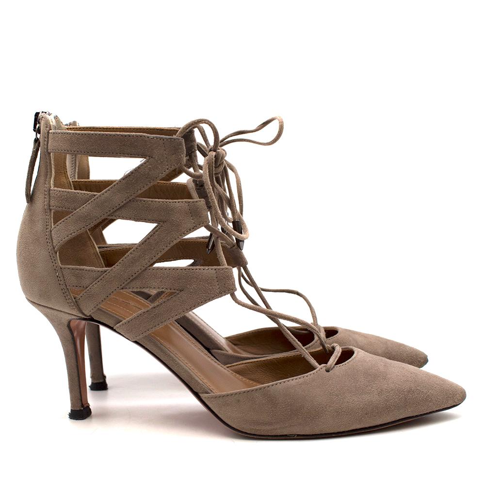 Aquazzura Taupe Suede Lace-Up Pumps

- Taupe-Grey Suede, mid-heel lace up pumps
- Suede lace-up fastening 
- Leather lining and sole.
- Pointed toe
- Zipped back
- Silver-tone hardware 

Please note, these items are pre-owned and may show some signs