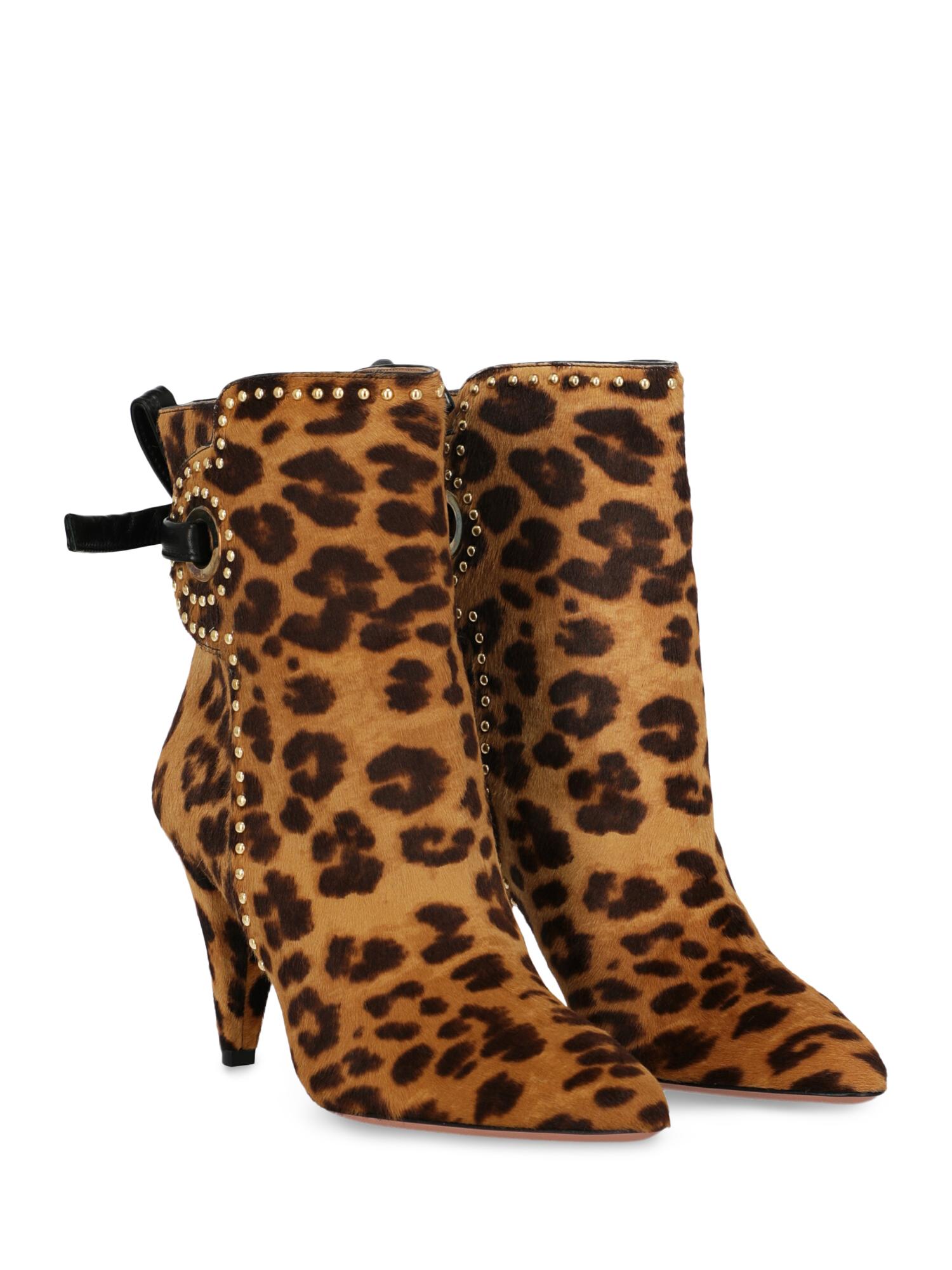 Product Description: Ankle boots, leather, animal print, pony, lace-up, gold-tone hardware, pointed toe, branded sole, cone heel, mid heel, leather lining, rockstud embellishment.

Product Condition: Excellent. Upper: negligible