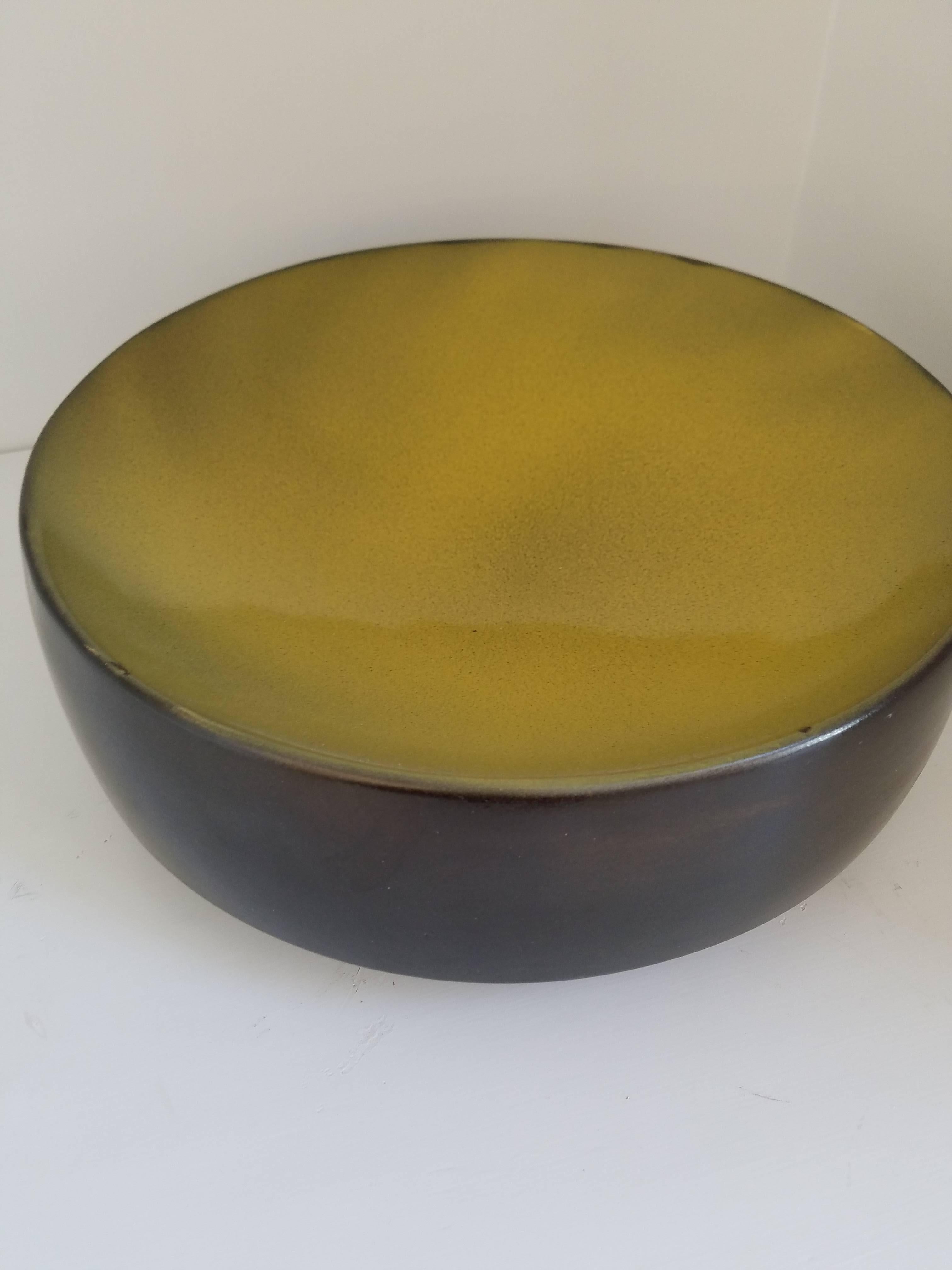 Hand thrown double glazed ceramic bowl with contrast color glaze.
