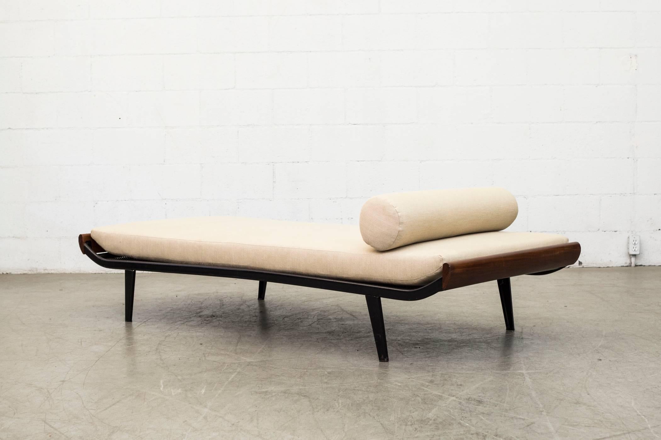 1960s Cleopatra daybed by A.R. Cordemeyer. Teak wood ends with enameled dark grey metal frame and 