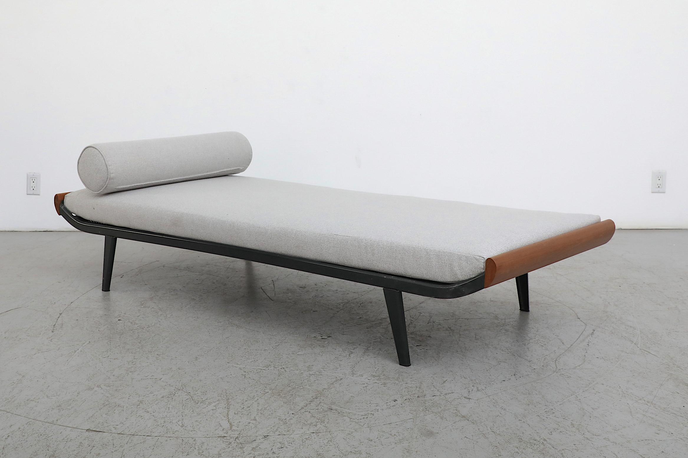 Mid-Century, 1960's Cleopatra narrow daybed by A.R. Cordemeyer with teak wood ends, enameled dark grey metal frame and 