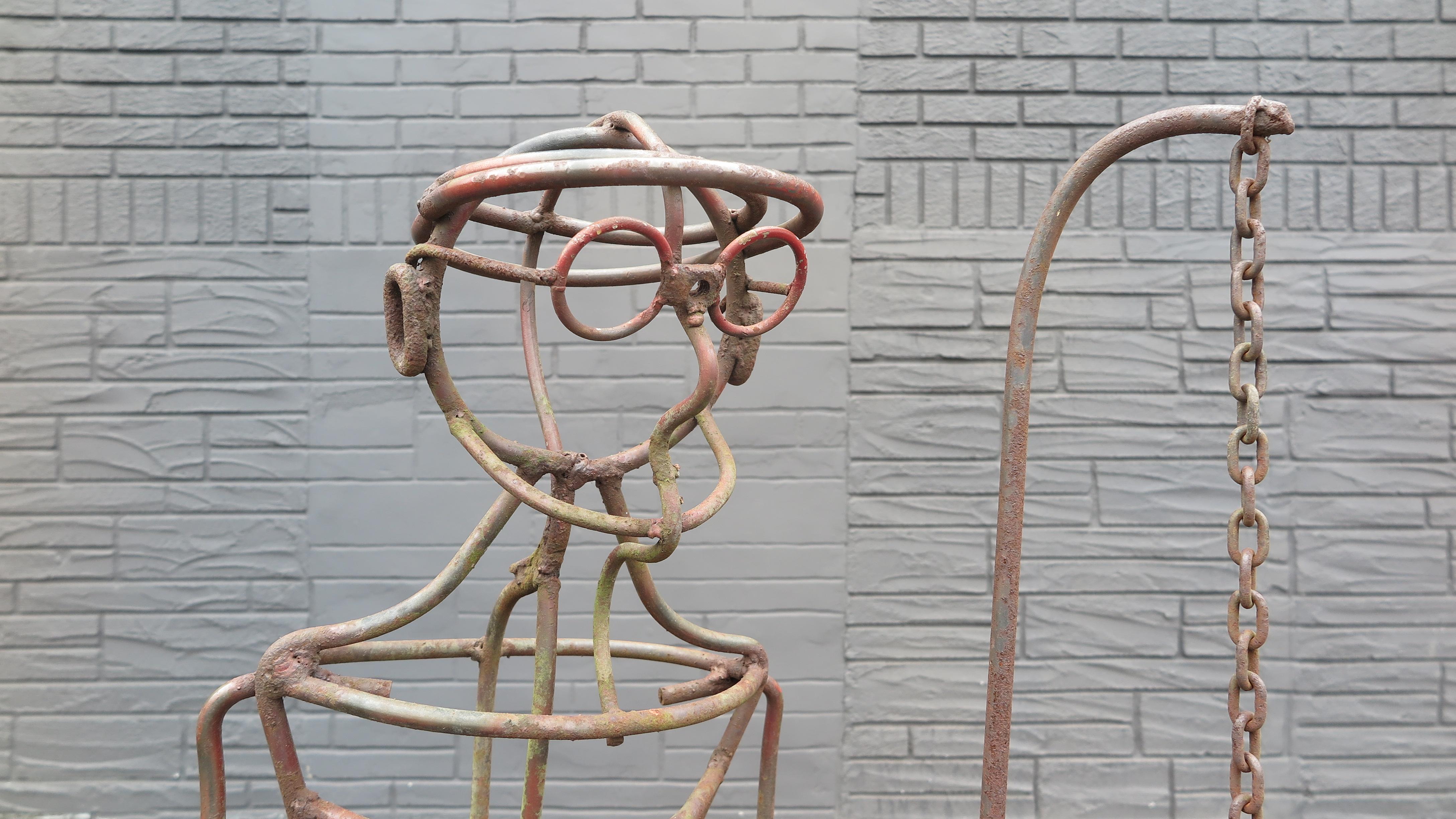 A.R. Escultura de metal 