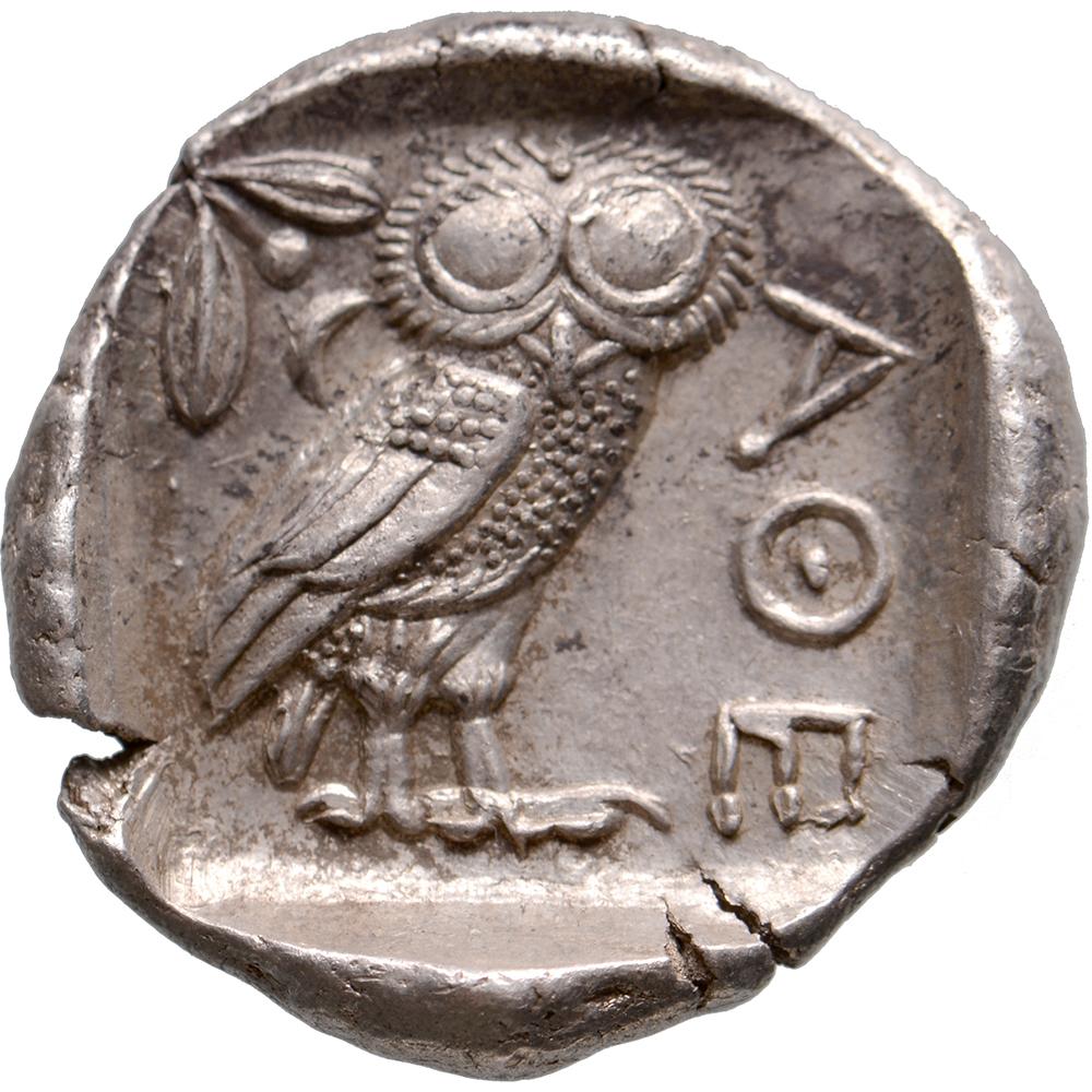 Obverse: head of Athena right, wearing earring, necklace, and crested Attic helmet decorated with three olive leaves over visor and spiral palmette
Reverse: owl standing right with head facing, olive sprig with berry and crescent in upper left